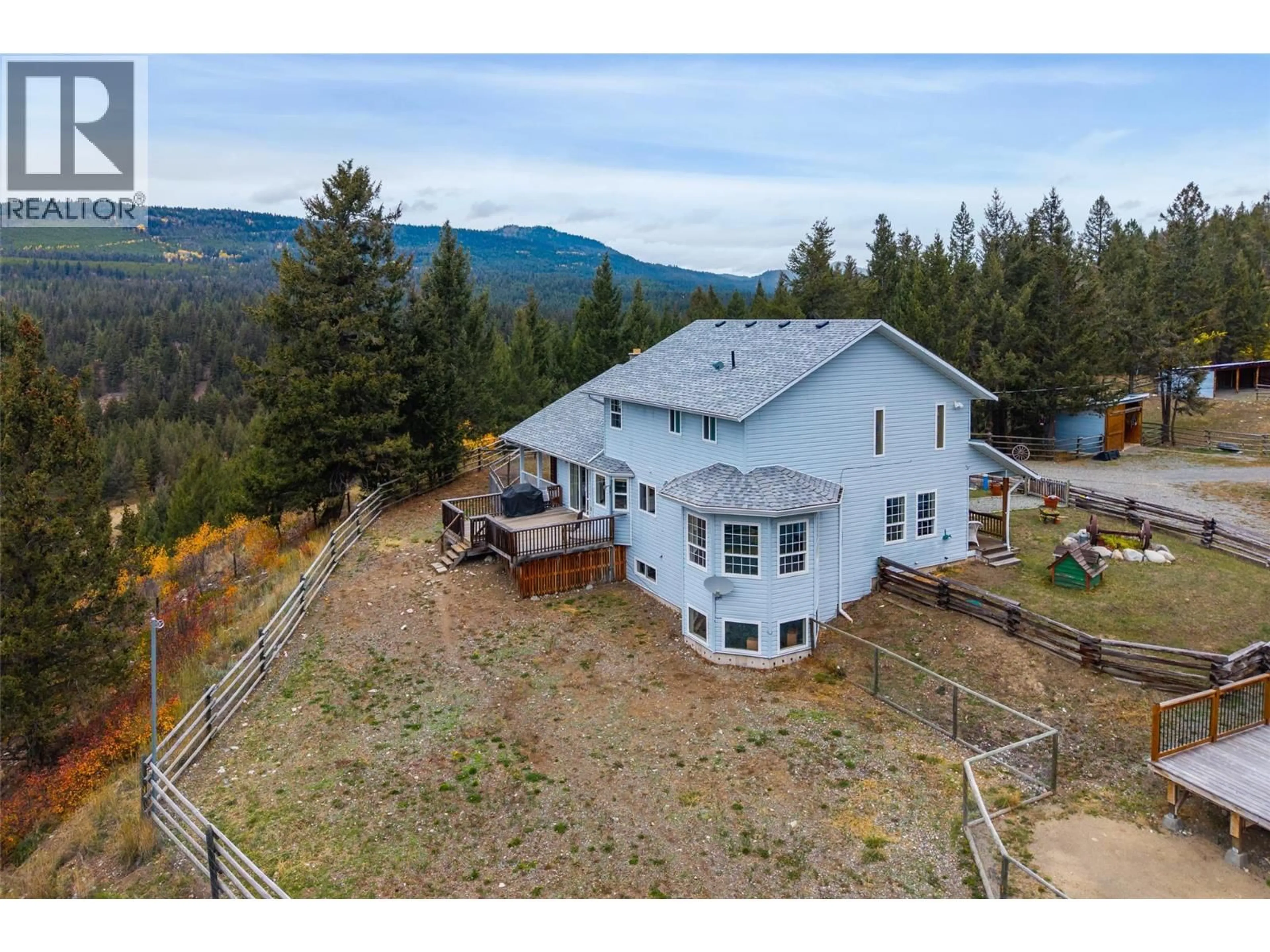 A pic from outside/outdoor area/front of a property/back of a property/a pic from drone, mountain view for 5809 BEECH ROAD, Merritt British Columbia V1K1M6
