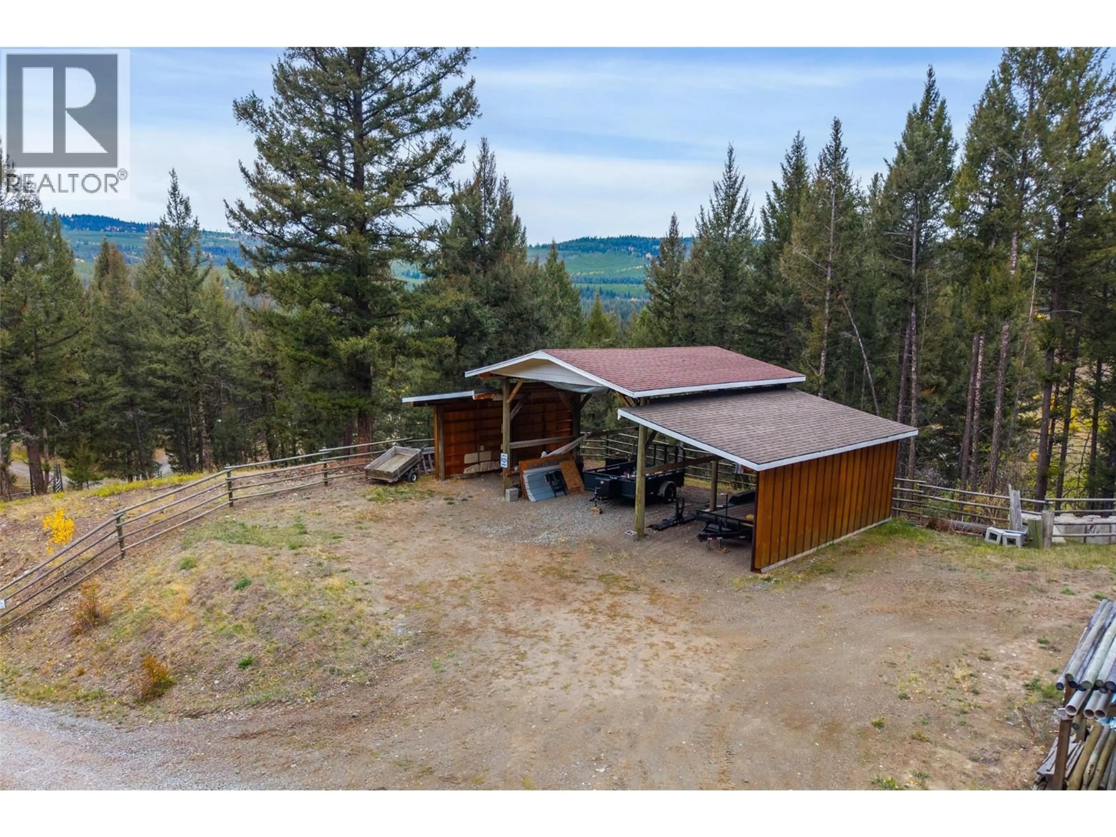 A pic from outside/outdoor area/front of a property/back of a property/a pic from drone, forest/trees view for 5809 BEECH ROAD, Merritt British Columbia V1K1M6