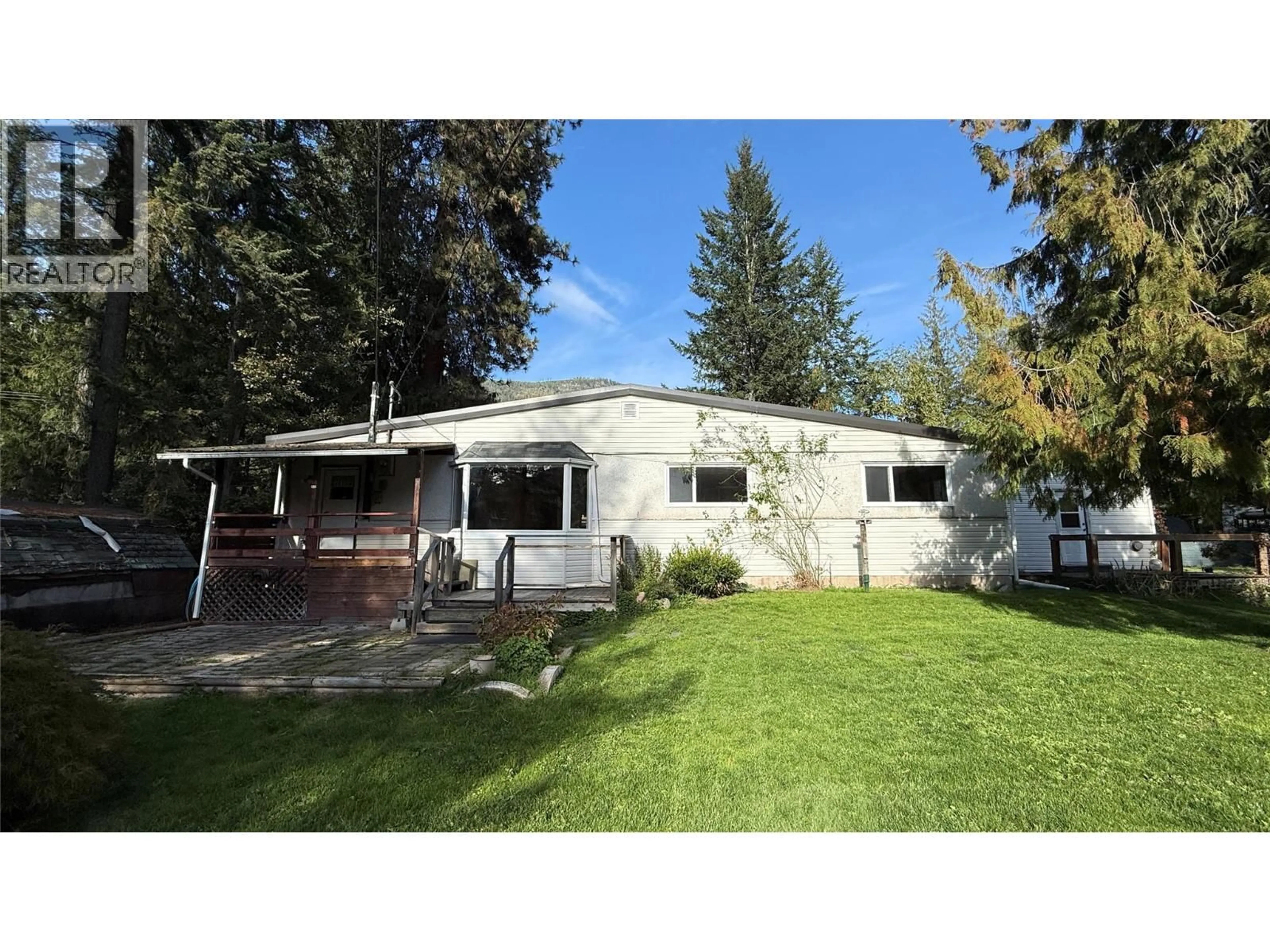 Home with vinyl exterior material, street for 4630 3A HIGHWAY, Nelson British Columbia V1L6N3