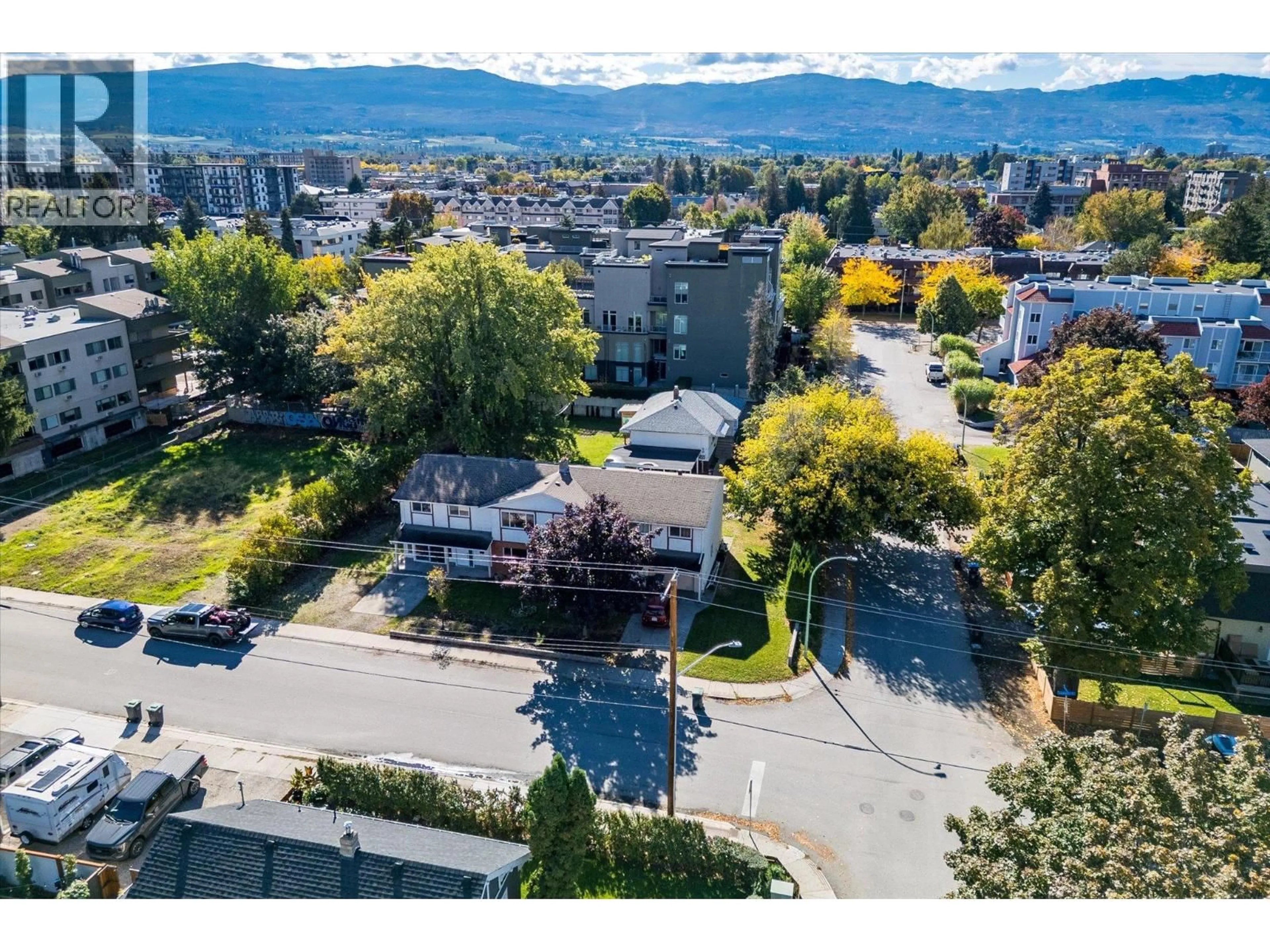 A pic from outside/outdoor area/front of a property/back of a property/a pic from drone, mountain view for 1011-1013 LAWSON AVENUE, Kelowna British Columbia V1Y6T3
