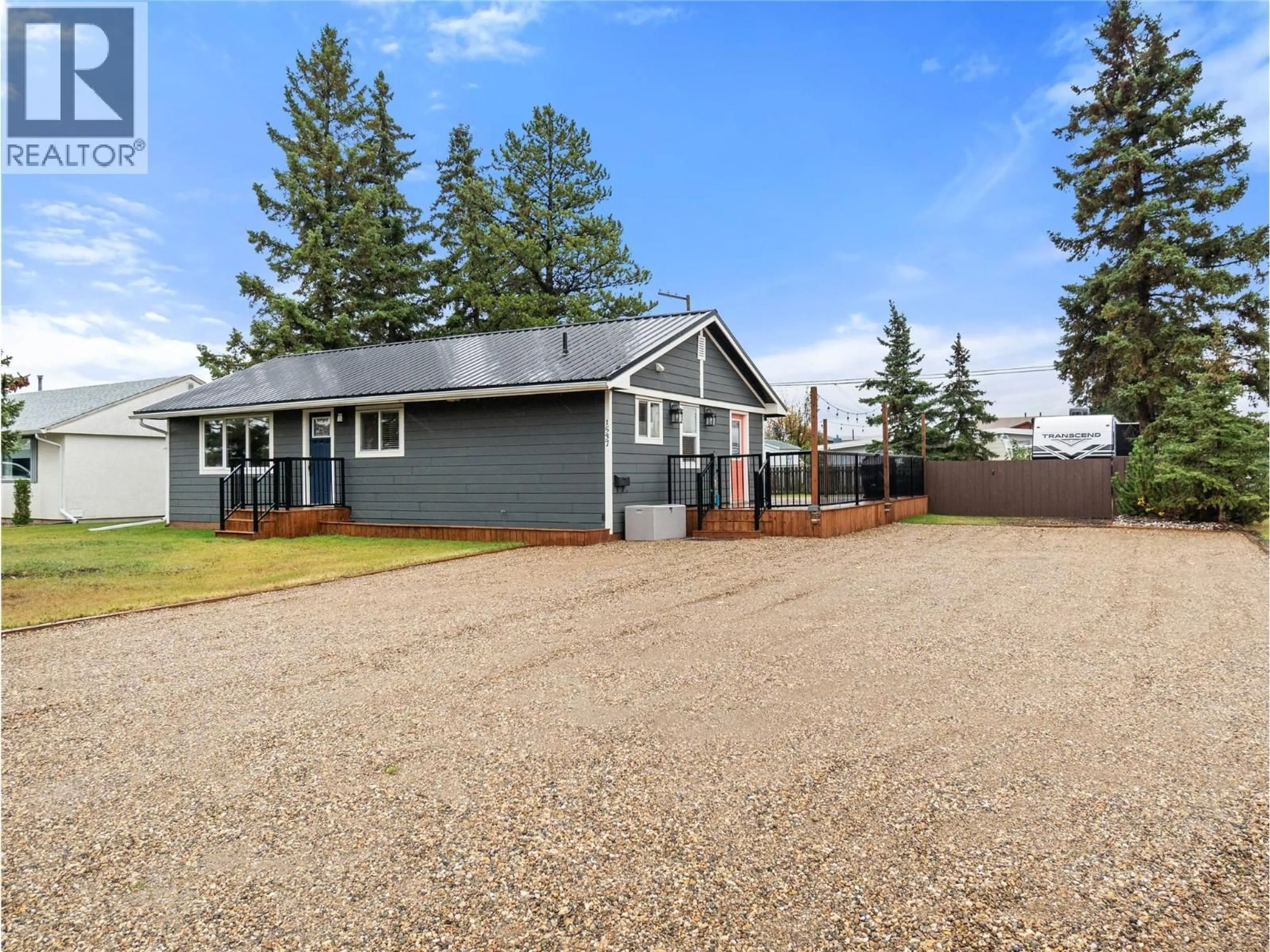 Home with vinyl exterior material, street for 1537 115 AVENUE, Dawson Creek British Columbia V1G3C6