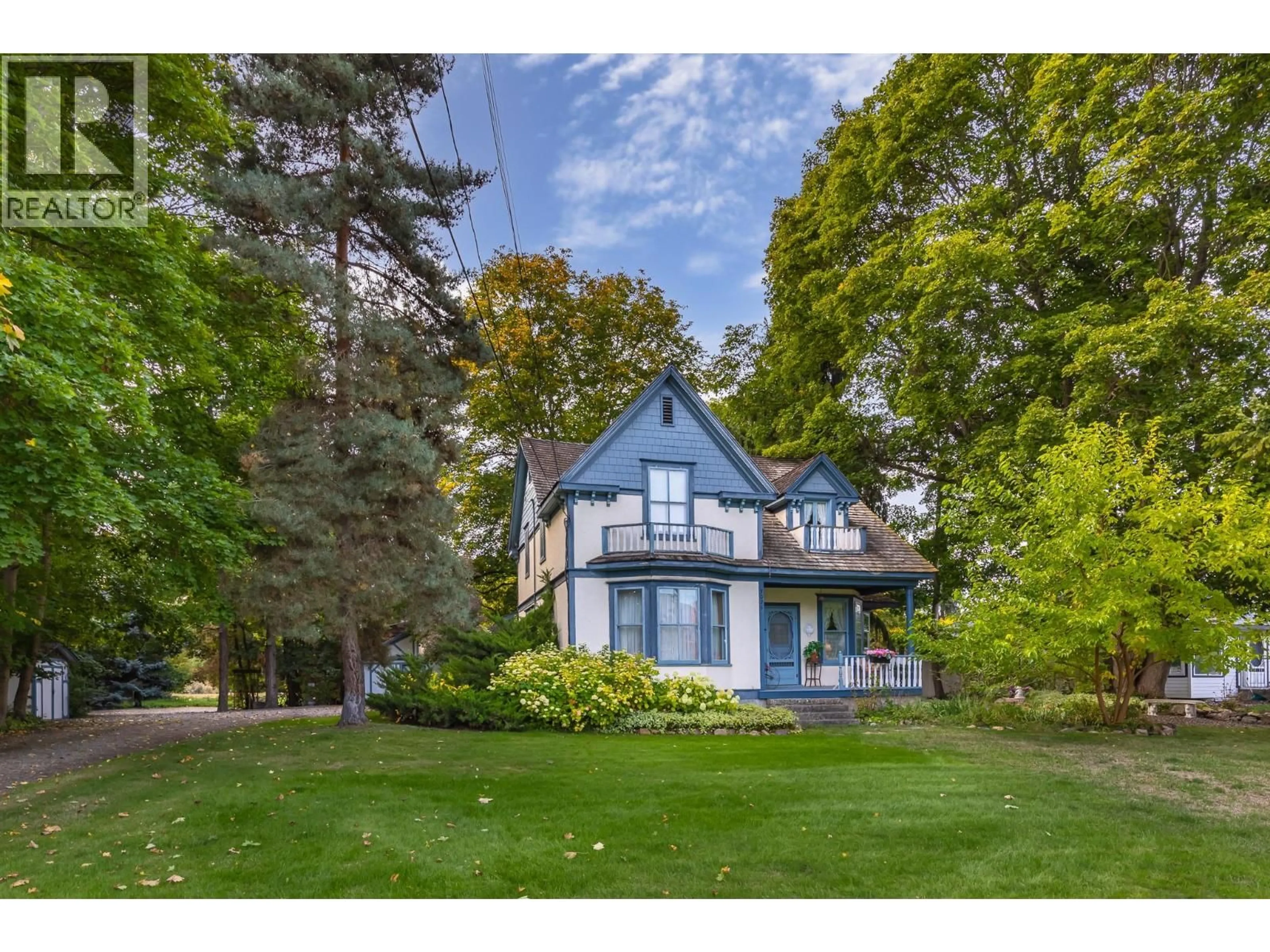 A pic from outside/outdoor area/front of a property/back of a property/a pic from drone, street for 3025 PATTERSON STREET, Armstrong British Columbia V4Y0G9
