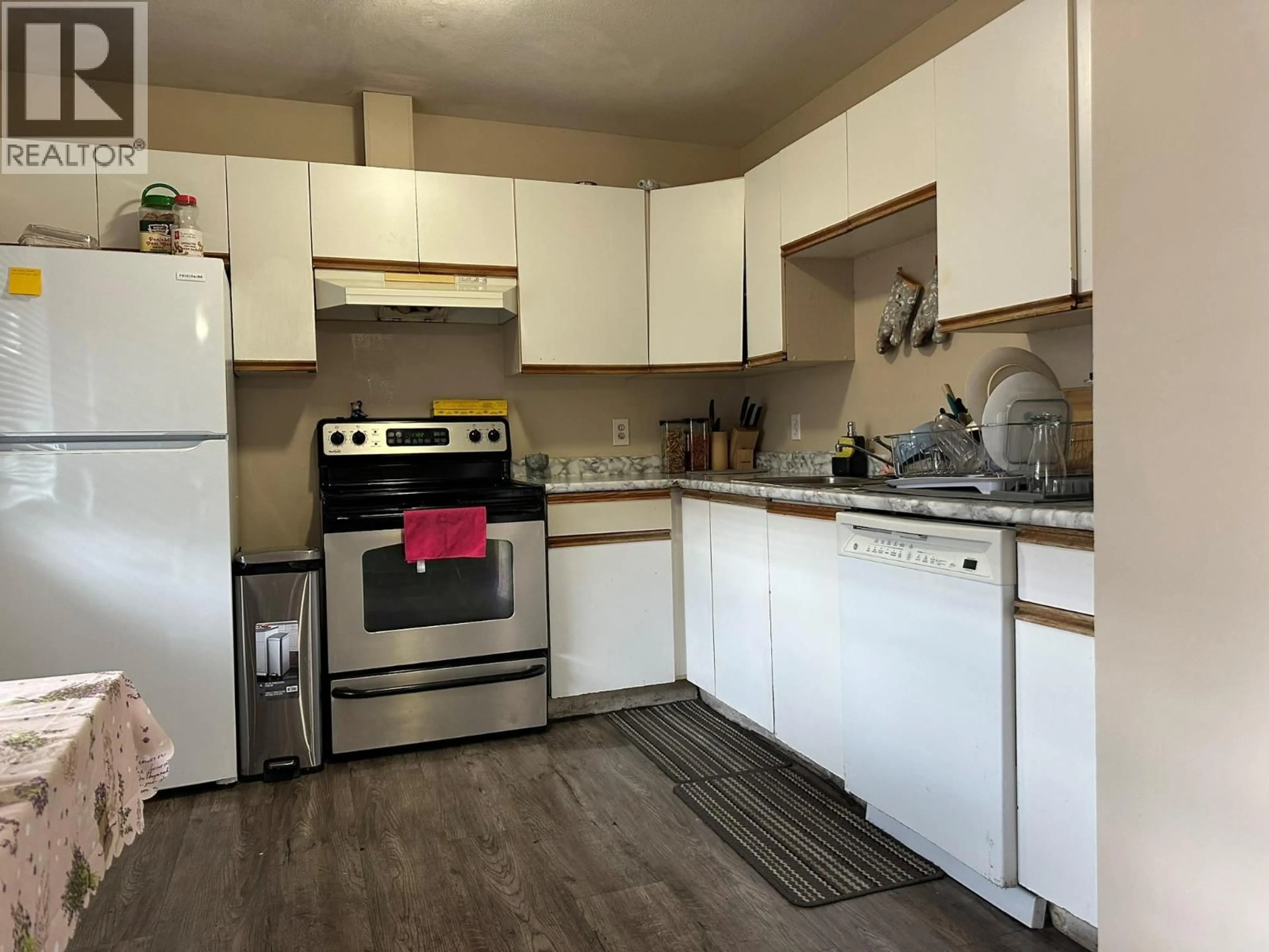 Standard kitchen, wood/laminate floor for 202 - 3710 24 AVENUE, Vernon British Columbia V1T1L9