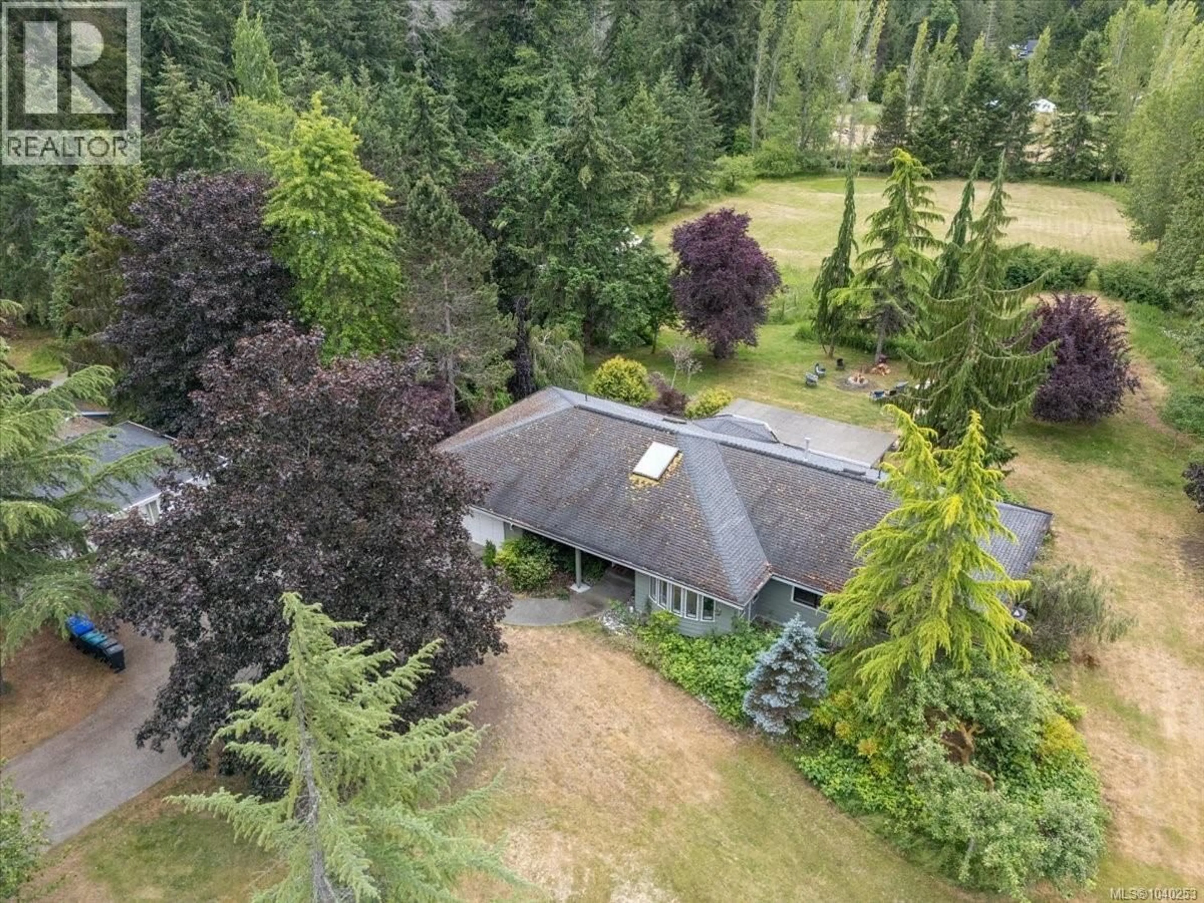 A pic from outside/outdoor area/front of a property/back of a property/a pic from drone, forest/trees view for 880 GARDEN ROAD EAST, Qualicum Beach British Columbia V9K1N2