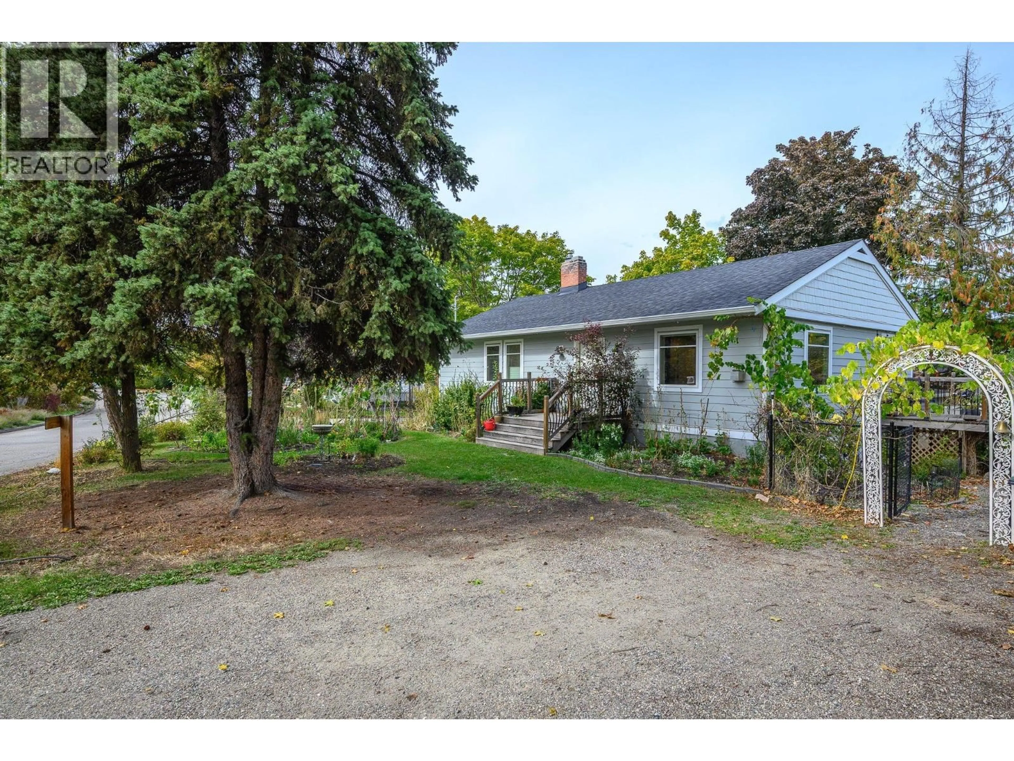 A pic from outside/outdoor area/front of a property/back of a property/a pic from drone, street for 2003 30 AVENUE, Vernon British Columbia V1T2A6