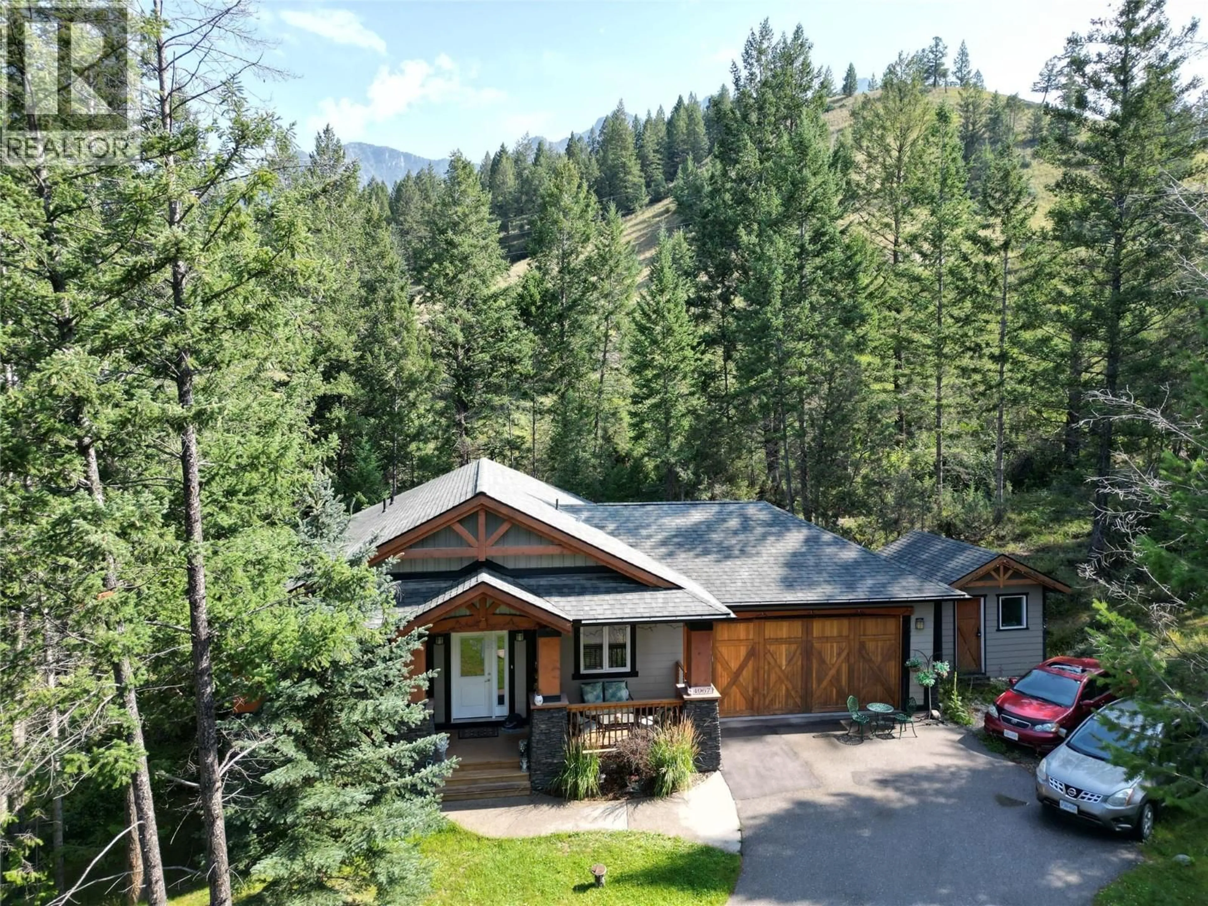 A pic from outside/outdoor area/front of a property/back of a property/a pic from drone, mountain view for 4967 SADDLEWOOD LANE, Radium Hot Springs British Columbia V0A1M0