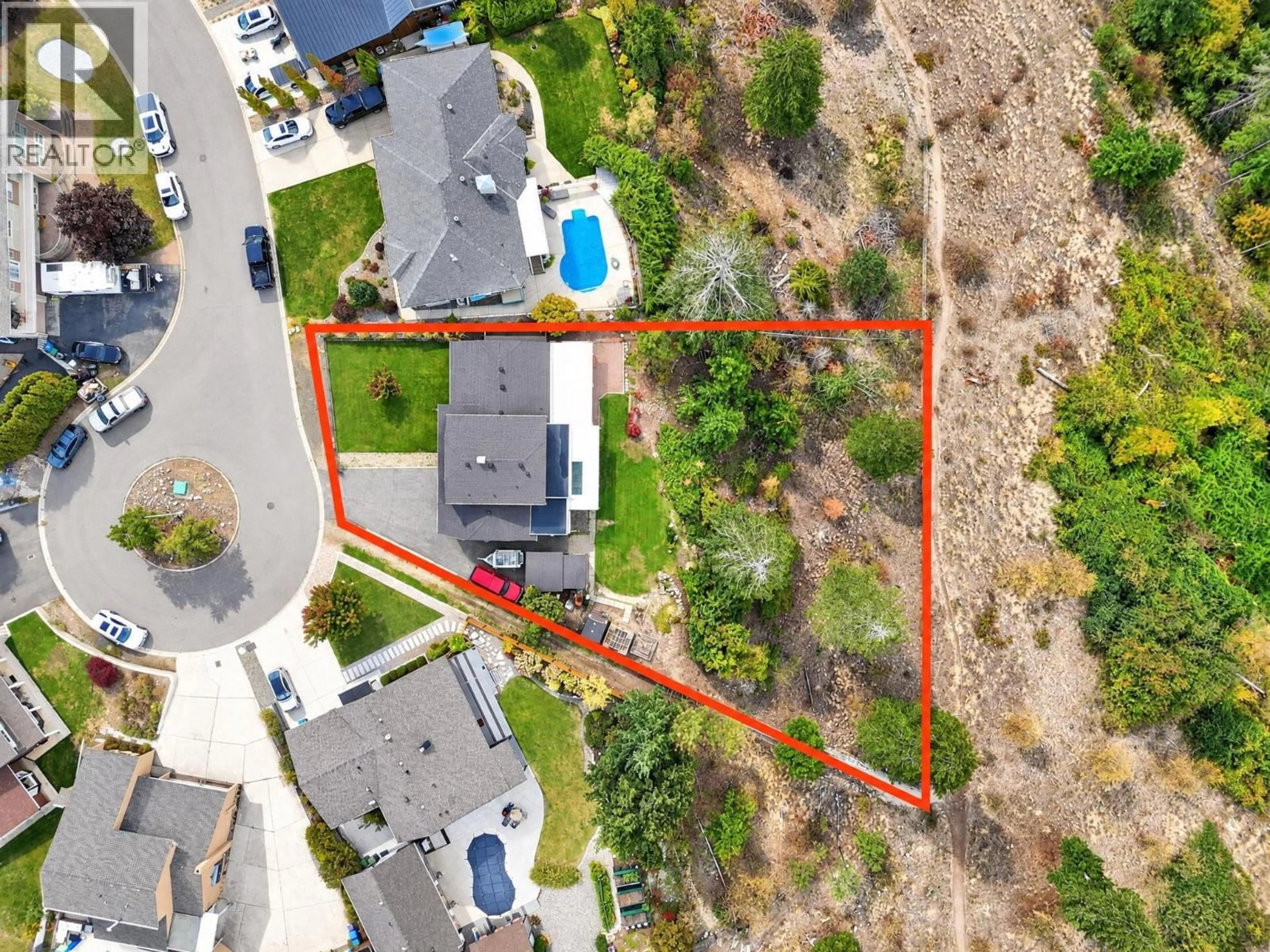 A pic from outside/outdoor area/front of a property/back of a property/a pic from drone, street for 2571 PINERIDGE PLACE, West Kelowna British Columbia V4T2J7