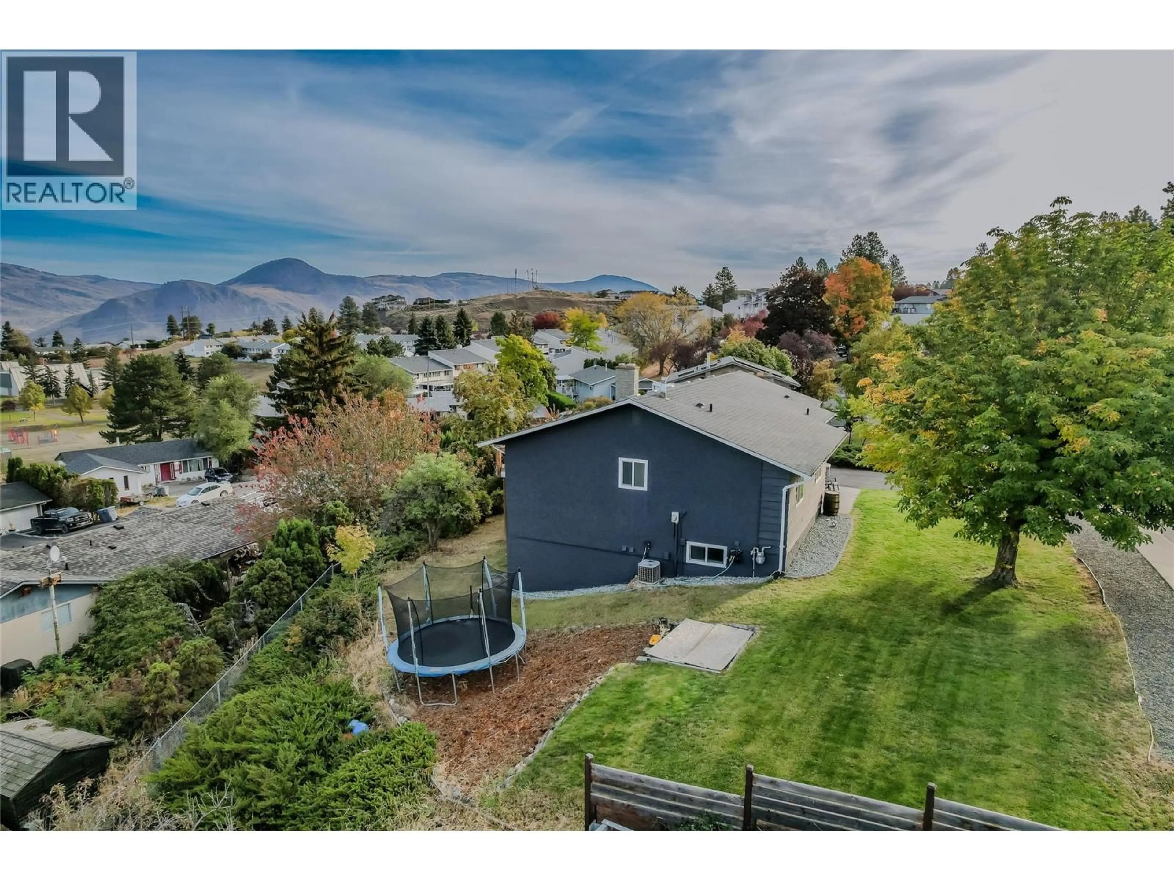 A pic from outside/outdoor area/front of a property/back of a property/a pic from drone, mountain view for 891 GLENEAGLES DRIVE, Kamloops British Columbia V2E1K2