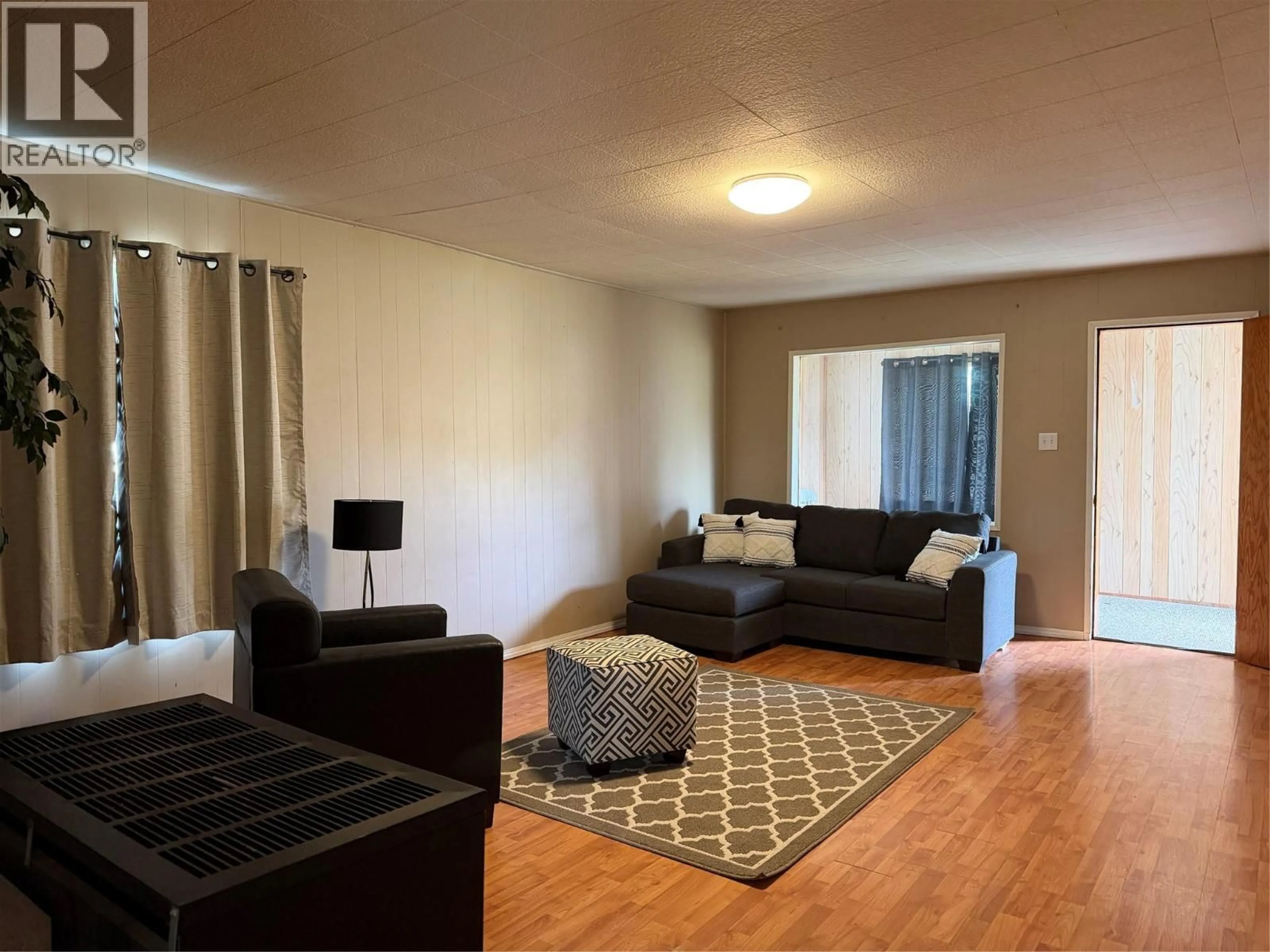 Living room with furniture, unknown for 1009 95 AVENUE, Dawson Creek British Columbia V1G1H9