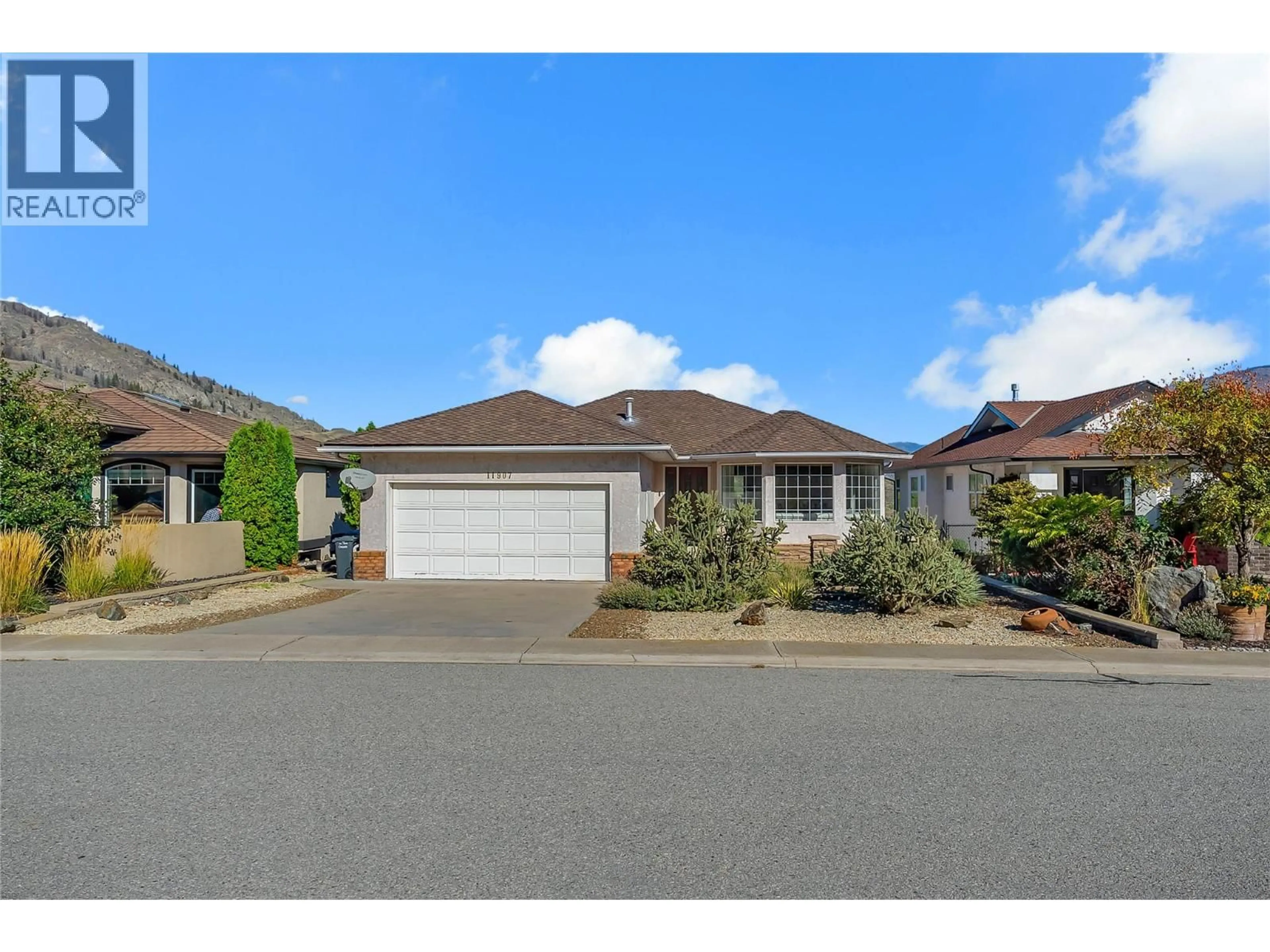 A pic from outside/outdoor area/front of a property/back of a property/a pic from drone, street for 11907 QUAIL RIDGE PLACE, Osoyoos British Columbia V0H1V4