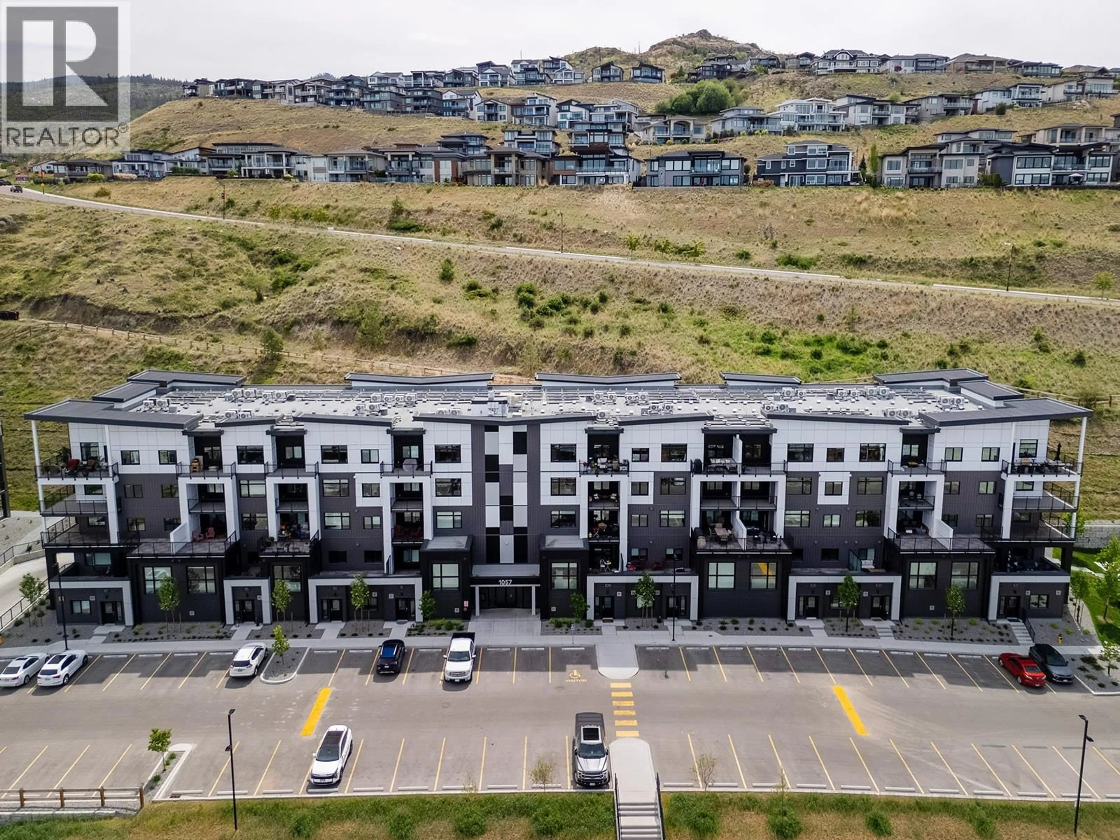 A pic from outside/outdoor area/front of a property/back of a property/a pic from drone, mountain view for 302 - 1057 FROST ROAD, Kelowna British Columbia V1W0G8
