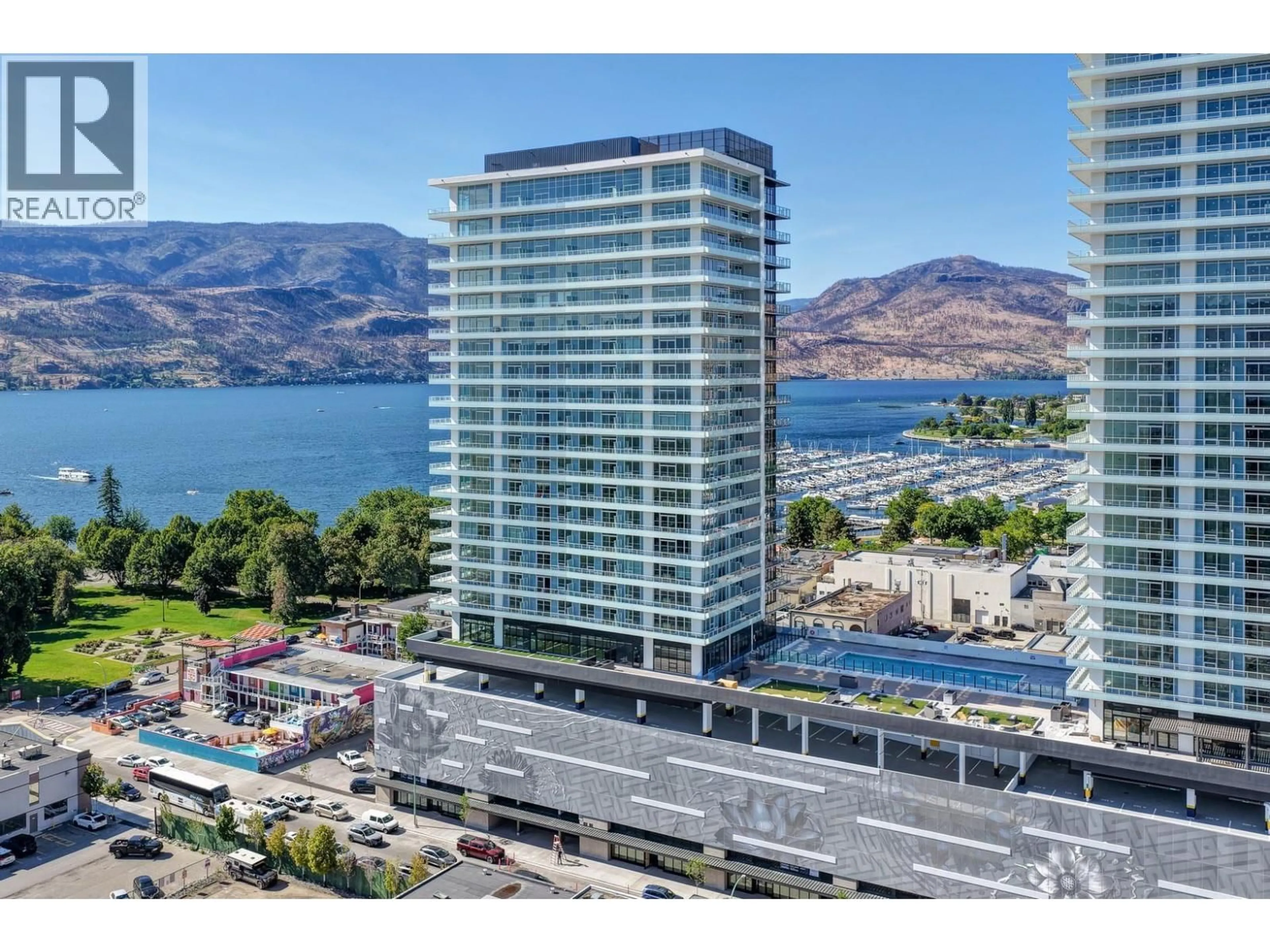 A pic from outside/outdoor area/front of a property/back of a property/a pic from drone, water/lake/river/ocean view for 808 - 238 LEON AVENUE, Kelowna British Columbia V1Y0N6