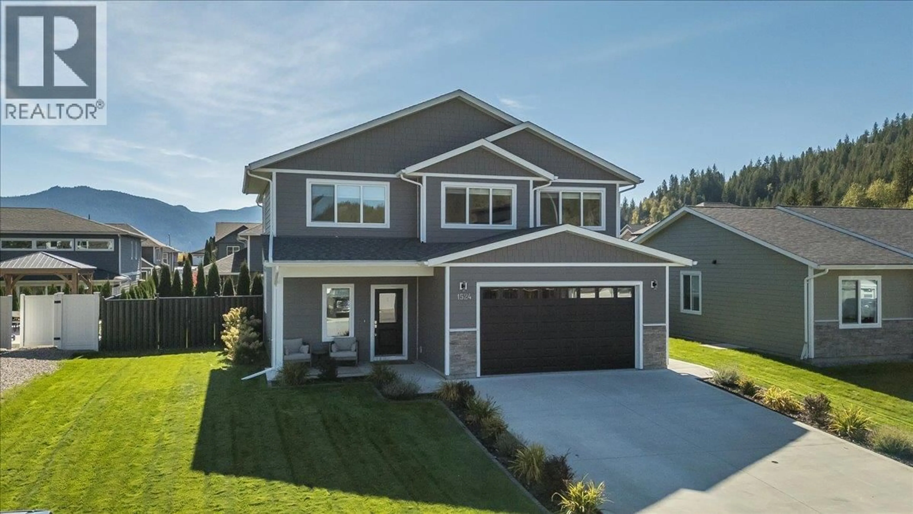 Home with vinyl exterior material, street for 1524 ASPEN LANE, Castlegar British Columbia V1N4X8