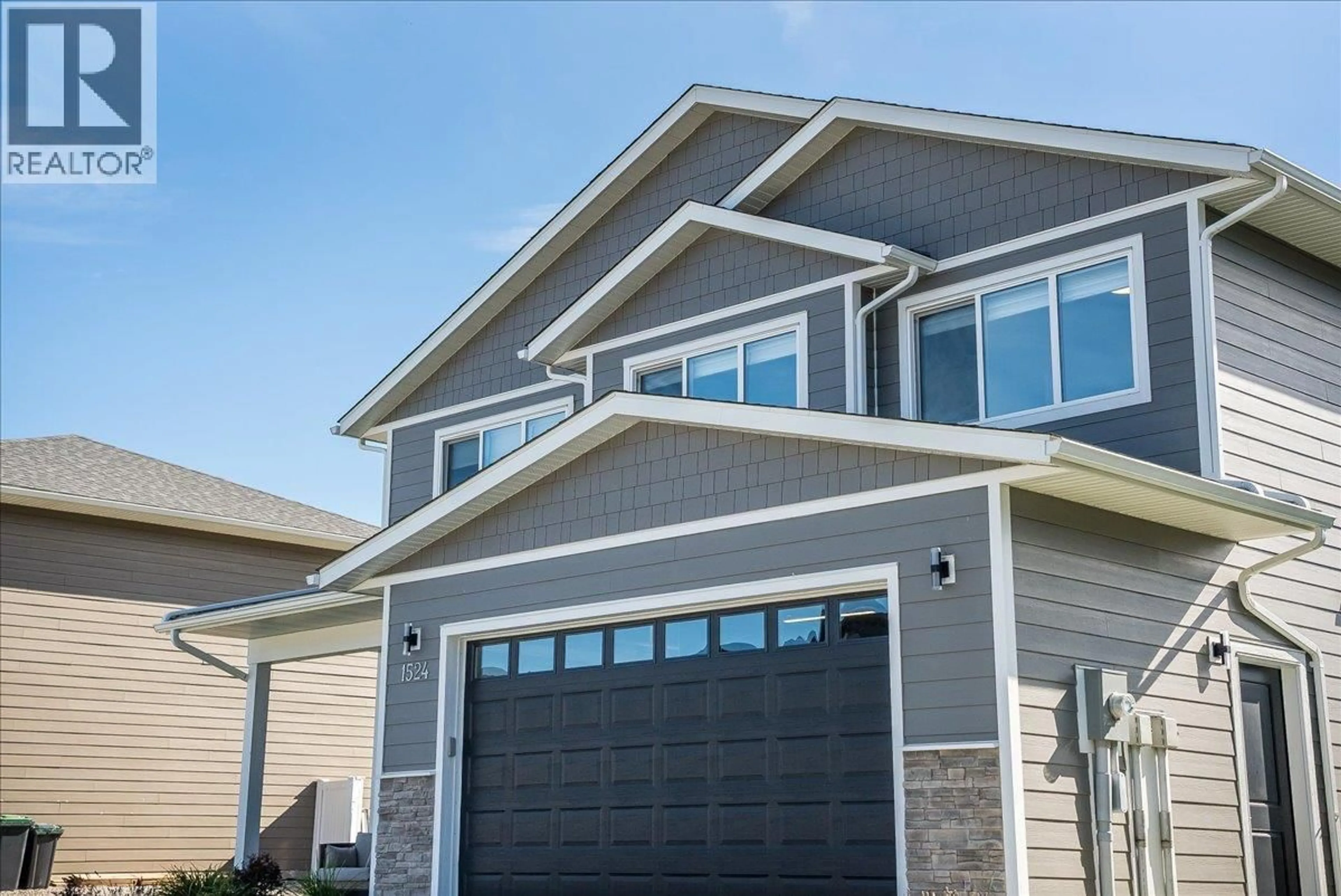 Home with vinyl exterior material, street for 1524 ASPEN LANE, Castlegar British Columbia V1N4X8