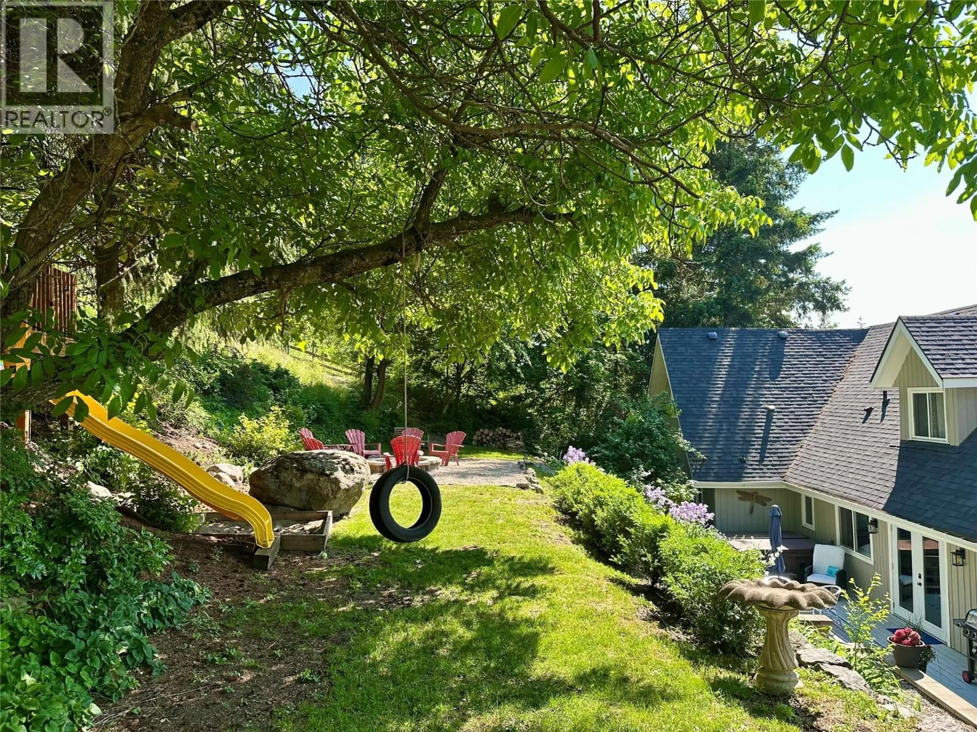 A pic from outside/outdoor area/front of a property/back of a property/a pic from drone, forest/trees view for 5221/5241 HARTNELL ROAD, Vernon British Columbia V1B3J4