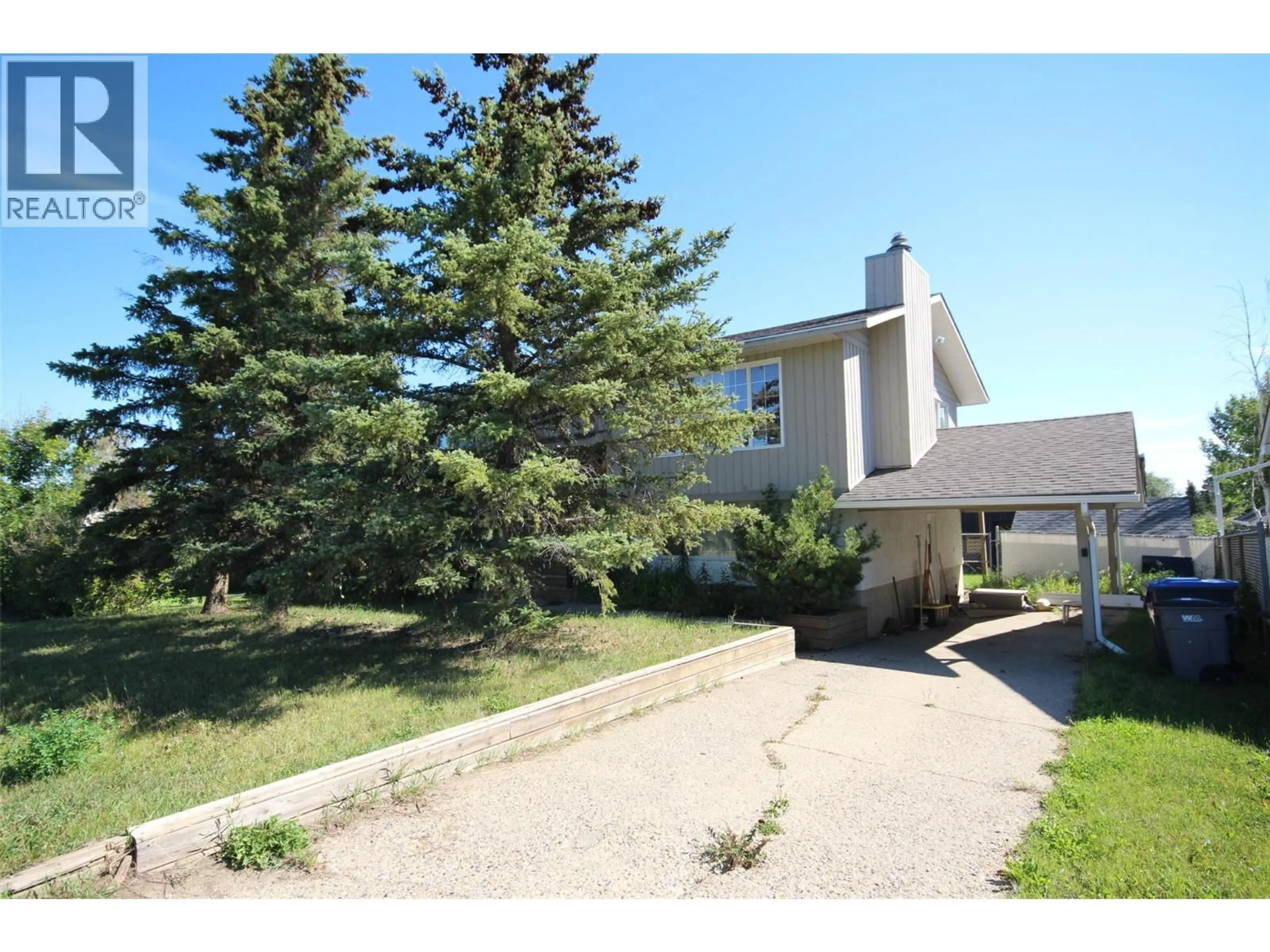 A pic from outside/outdoor area/front of a property/back of a property/a pic from drone, street for 11304 17 STREET, Dawson Creek British Columbia V1G4J5