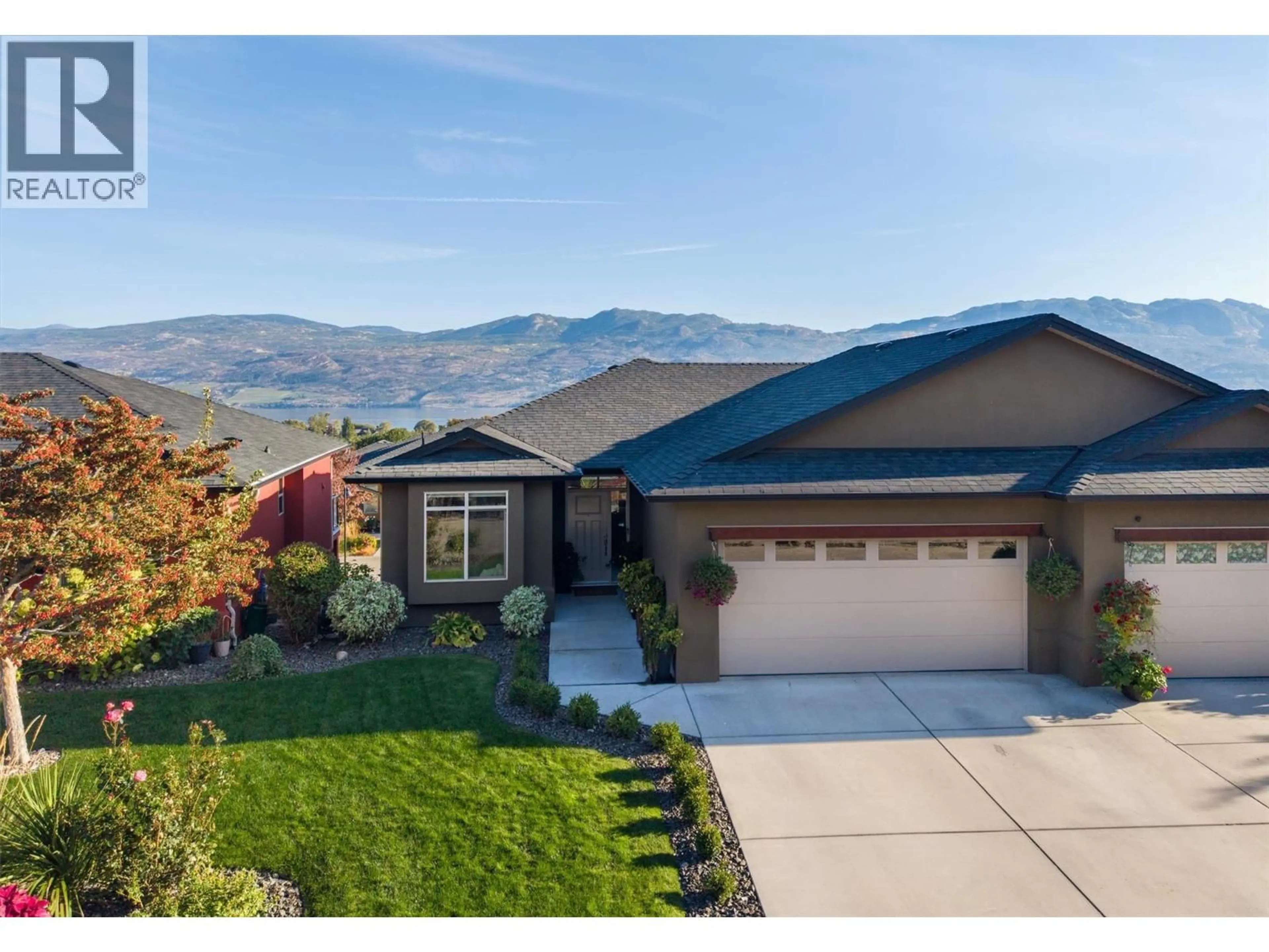Home with vinyl exterior material, mountain view for 2151 MADERA COURT, West Kelowna British Columbia V4T3H7
