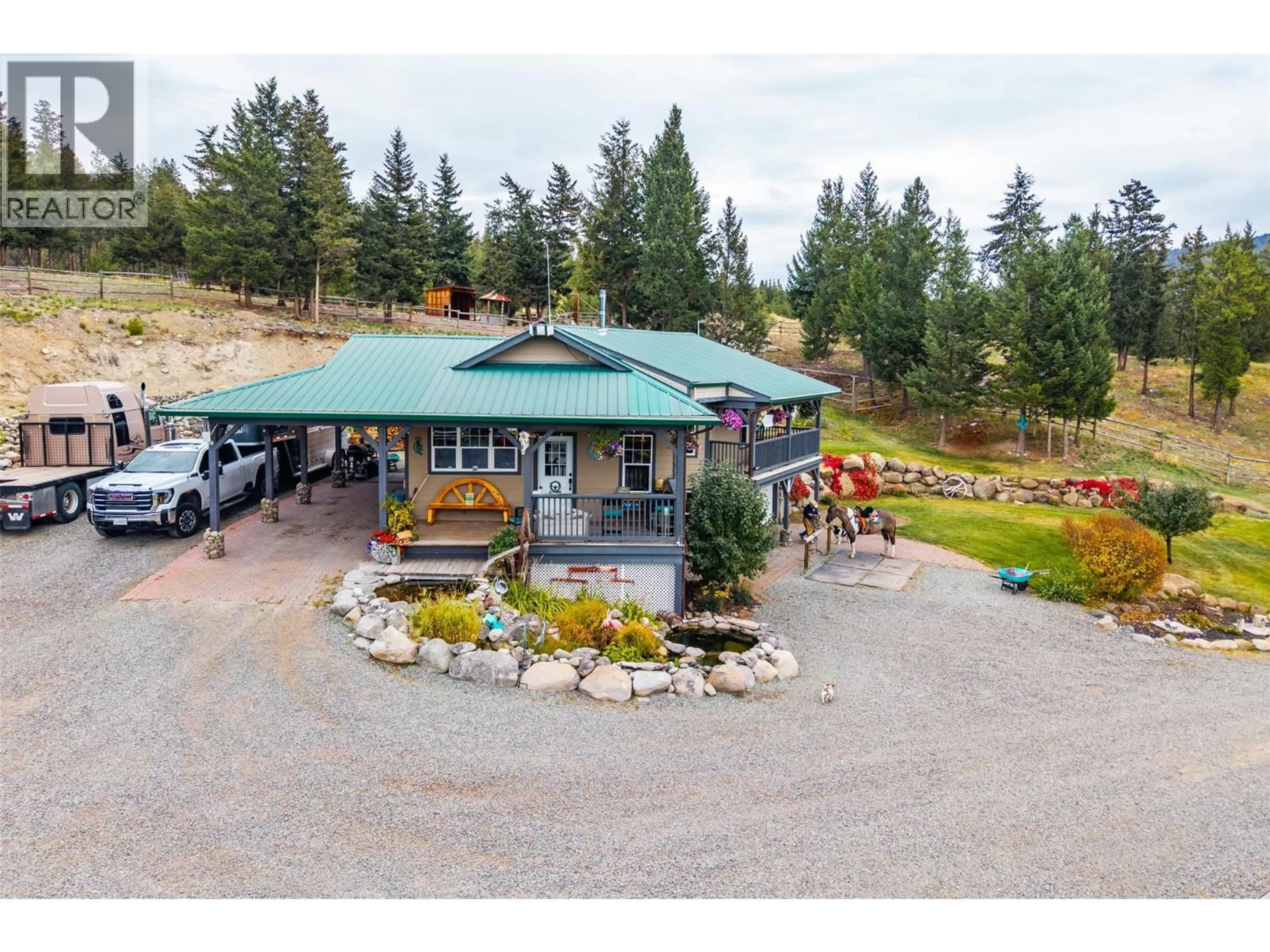A pic from outside/outdoor area/front of a property/back of a property/a pic from drone, mountain view for 11460 HWY 97C HIGHWAY, Merritt British Columbia V1K1M6