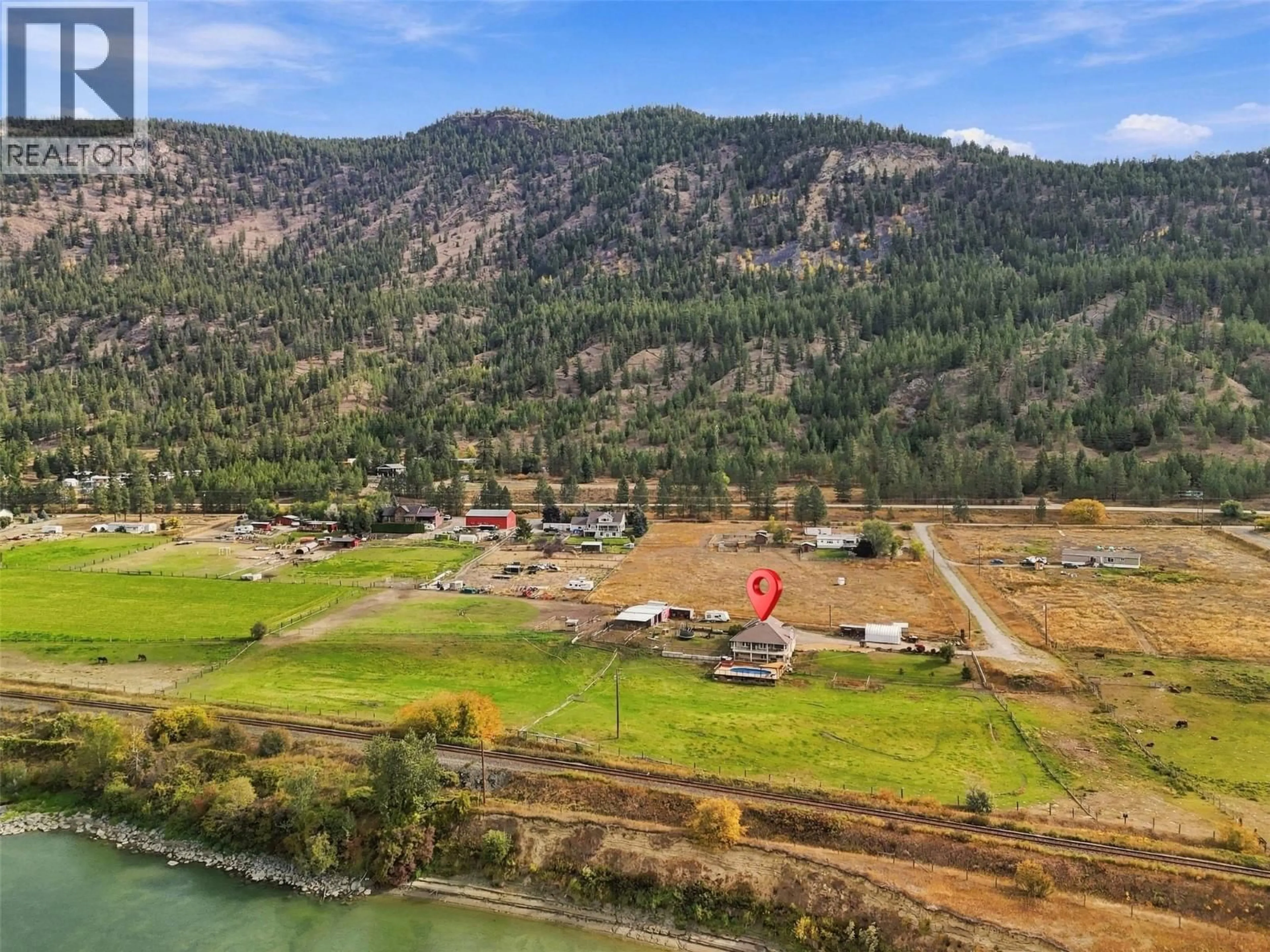 A pic from outside/outdoor area/front of a property/back of a property/a pic from drone, water/lake/river/ocean view for 165 HOOVERS FERRY ROAD, Kamloops British Columbia V0E1Z2