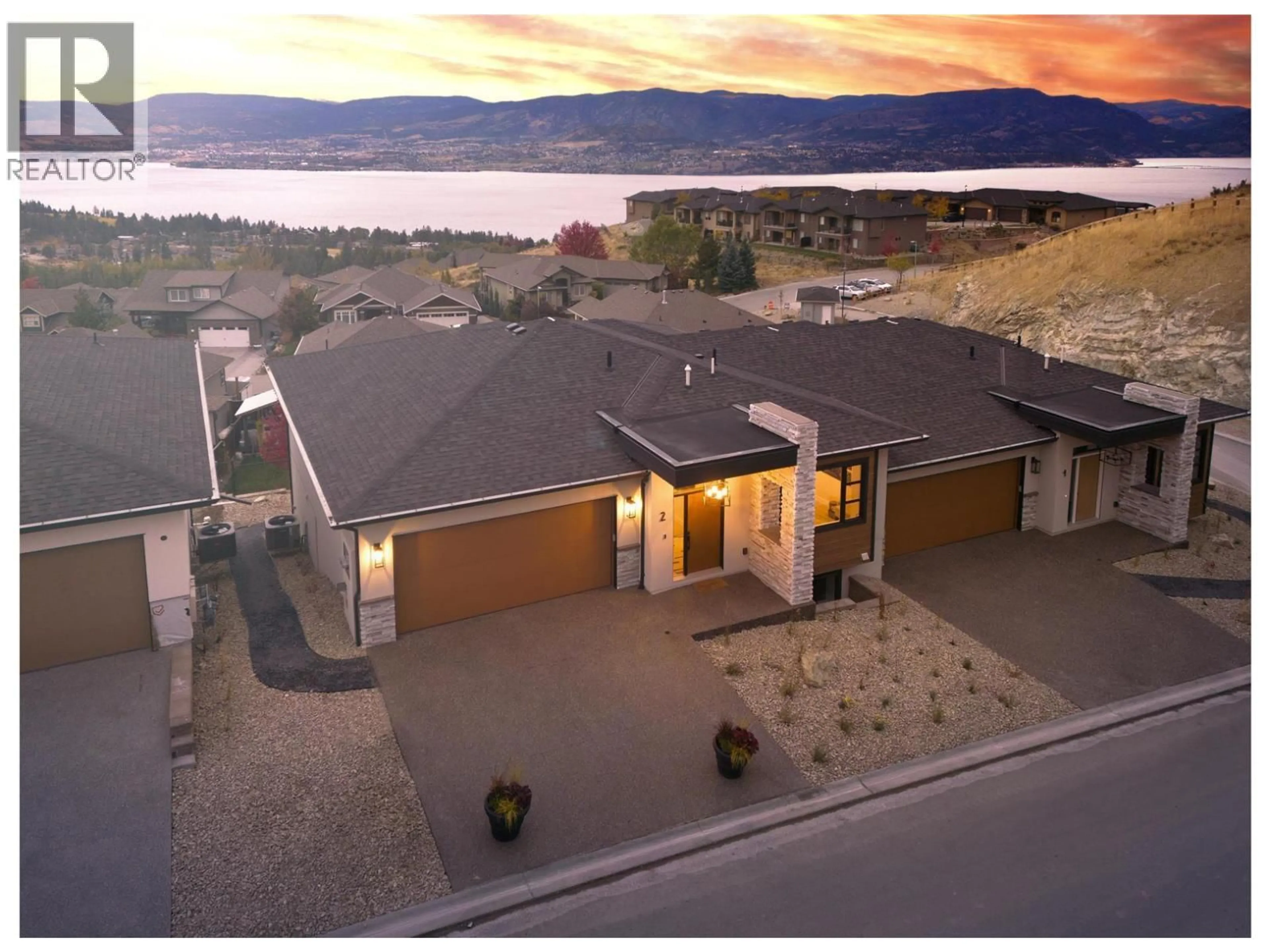 A pic from outside/outdoor area/front of a property/back of a property/a pic from drone, water/lake/river/ocean view for 2 - 796 KUIPERS CRESCENT, Kelowna British Columbia V1W0C2