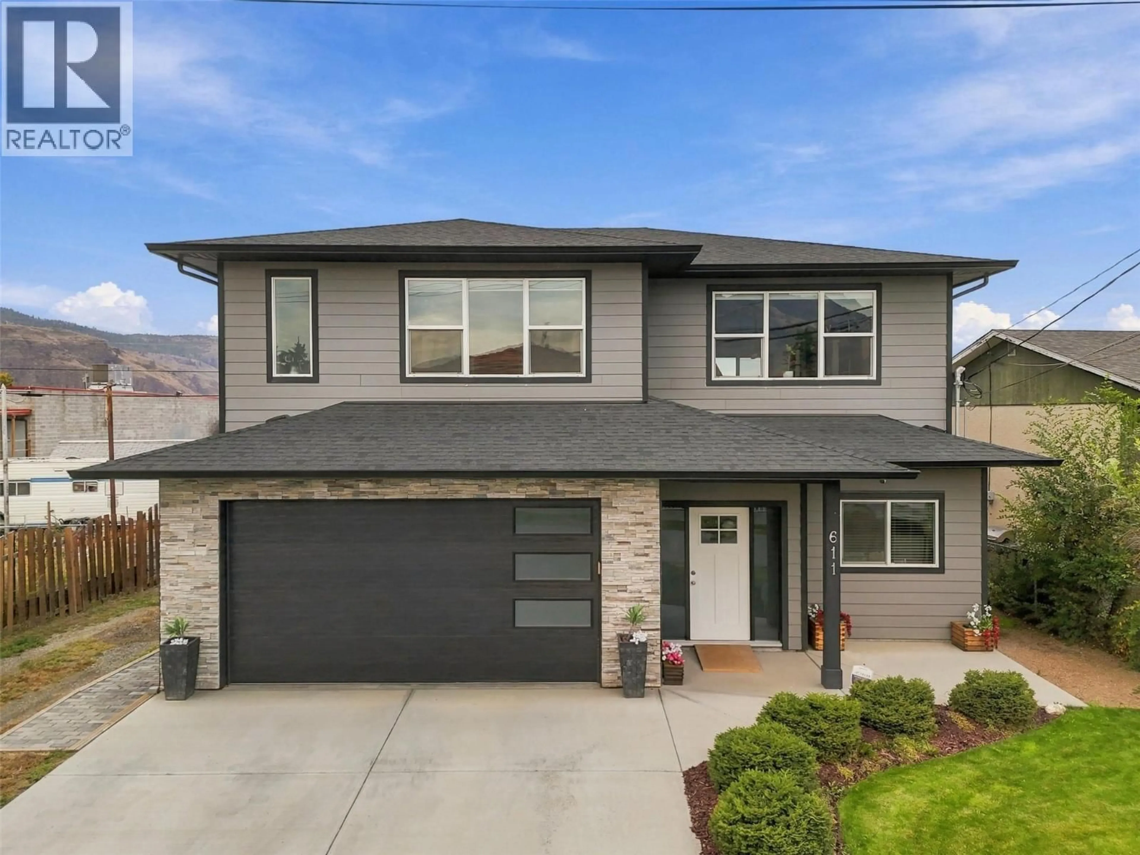 Home with brick exterior material, street for 611 MCGOWAN AVENUE, Kamloops British Columbia V2B2P7