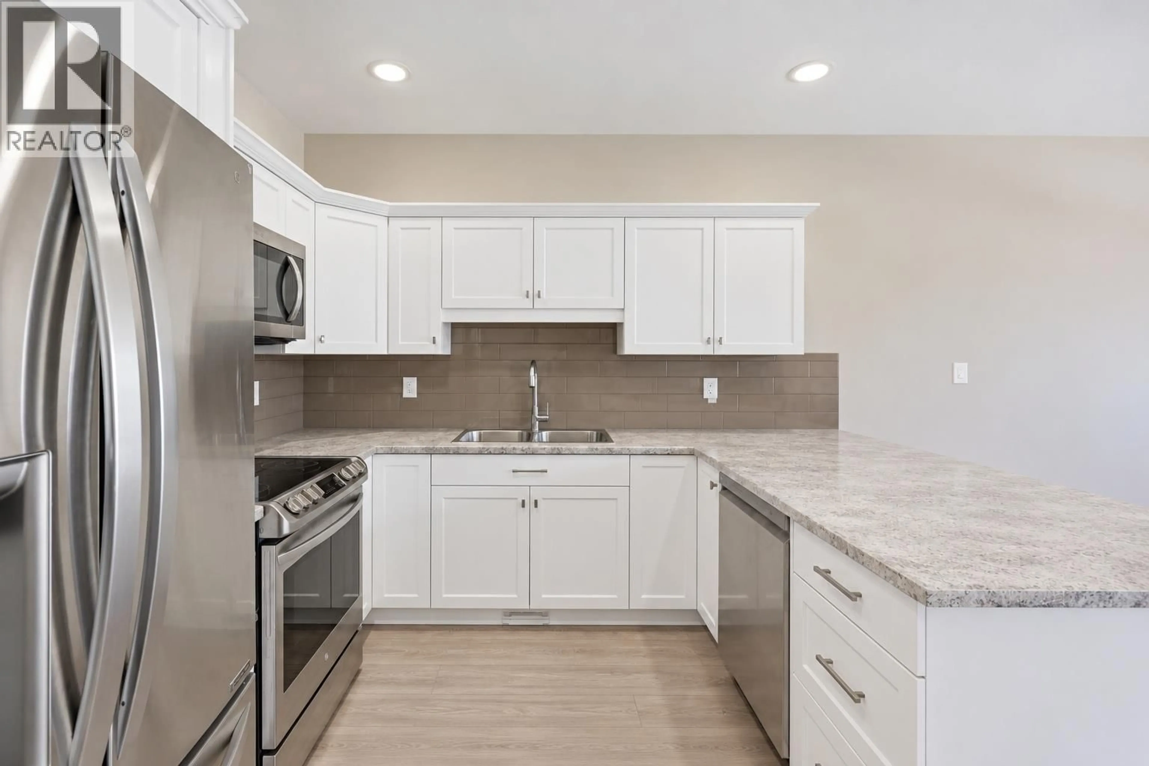 Open concept kitchen, ceramic/tile floor for 2352 BOSSERT AVENUE, Kamloops British Columbia V2B4V6