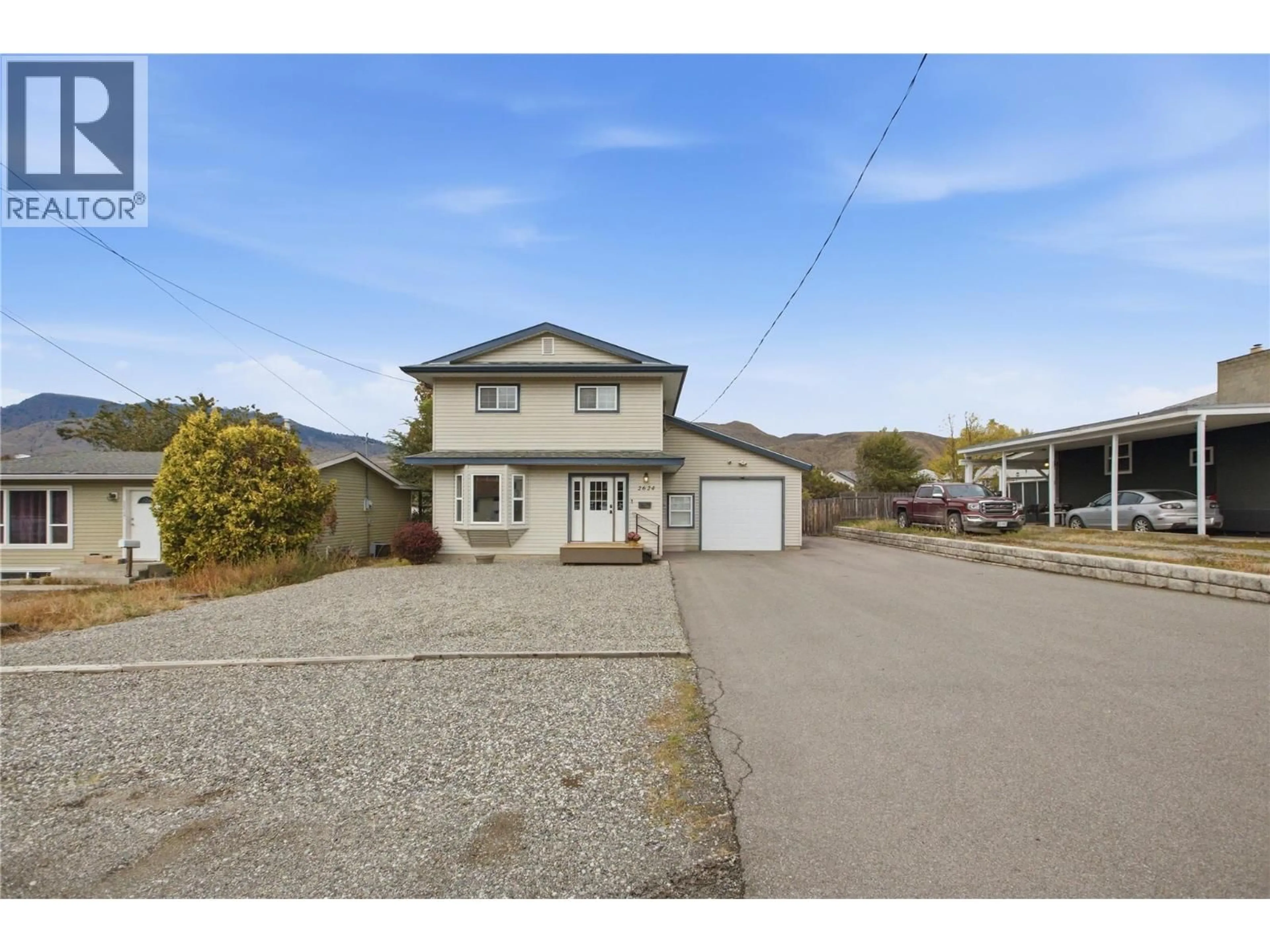 A pic from outside/outdoor area/front of a property/back of a property/a pic from drone, street for 2624 JOYCE AVENUE, Kamloops British Columbia V2B4M3