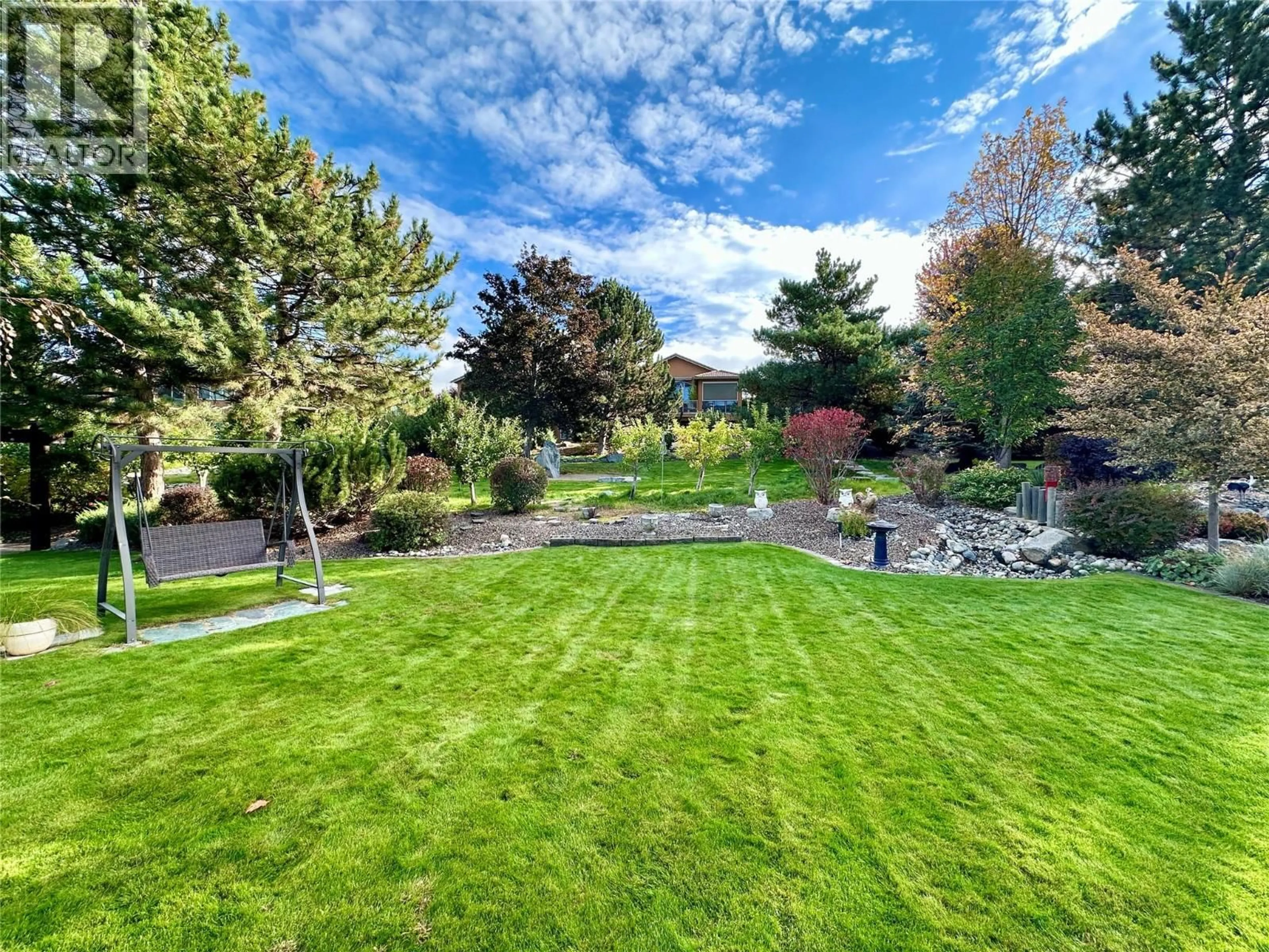 A pic from outside/outdoor area/front of a property/back of a property/a pic from drone, water/lake/river/ocean view for 13 WILDFLOWER COURT, Osoyoos British Columbia V0H1V0
