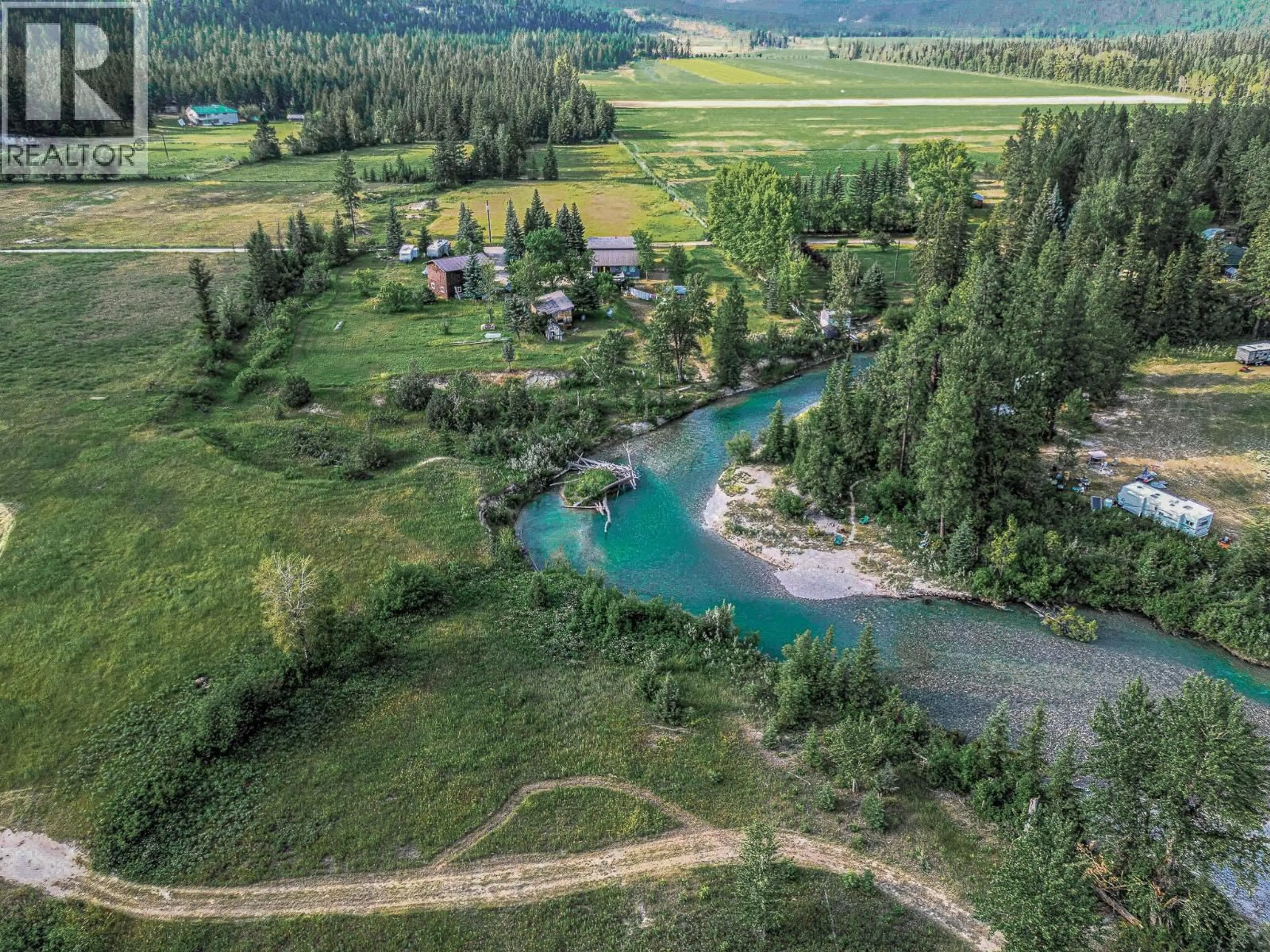 A pic from outside/outdoor area/front of a property/back of a property/a pic from drone, water/lake/river/ocean view for 3560 ISLAND POND ROAD, Skookumchuck British Columbia V0B2E0