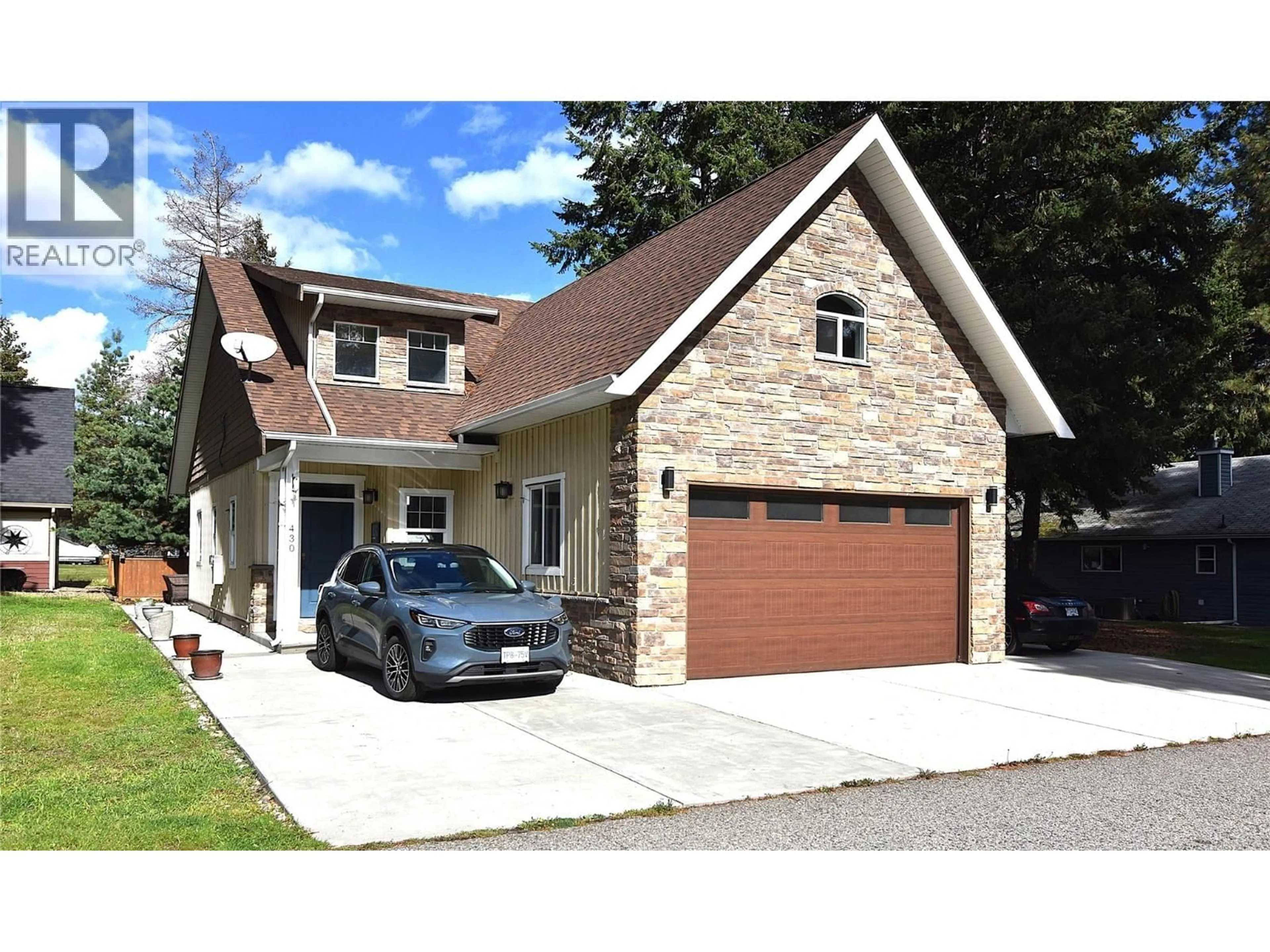 Home with brick exterior material, street for 430 HUMMINGBIRD AVENUE, Vernon British Columbia V1H2A1
