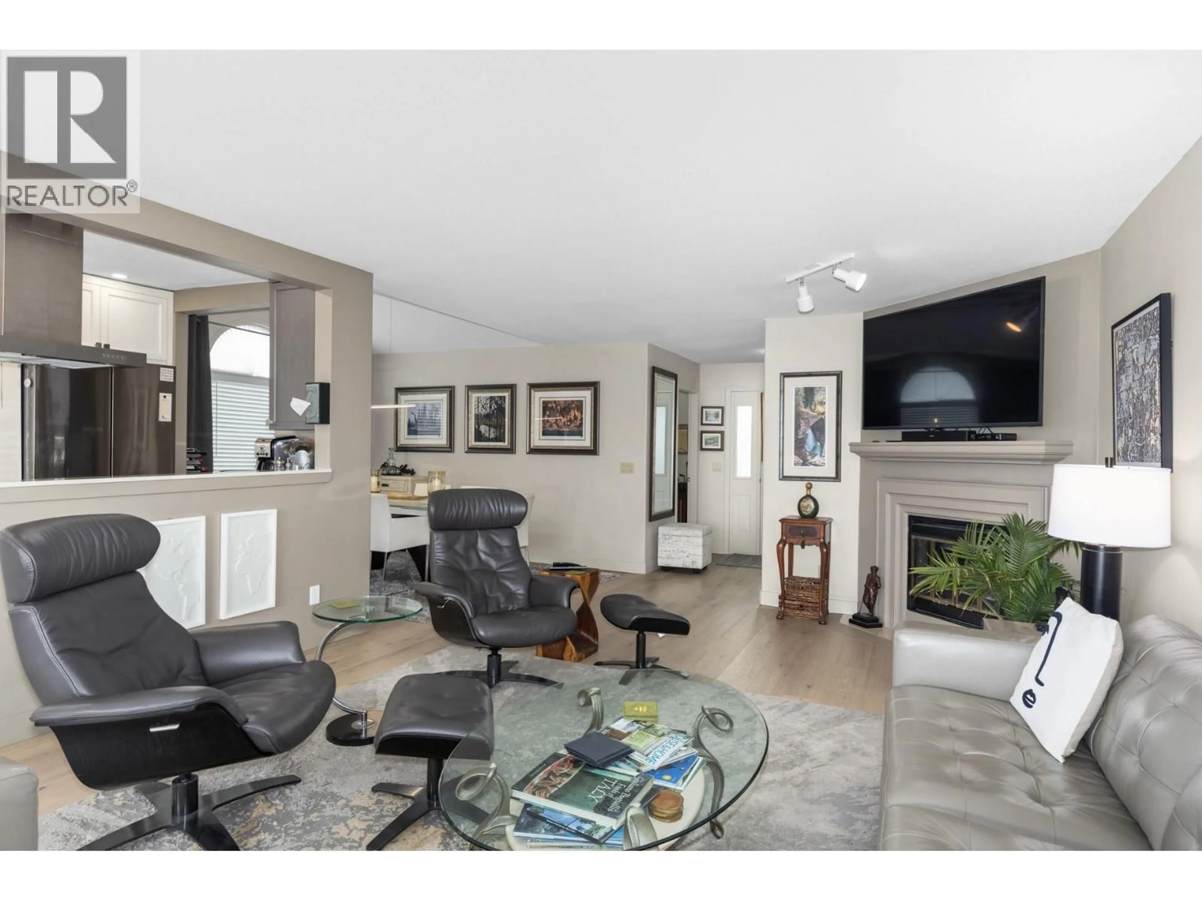 Living room with furniture, ceramic/tile floor for 9 - 1020 LANFRANCO ROAD, Kelowna British Columbia V1W3W6
