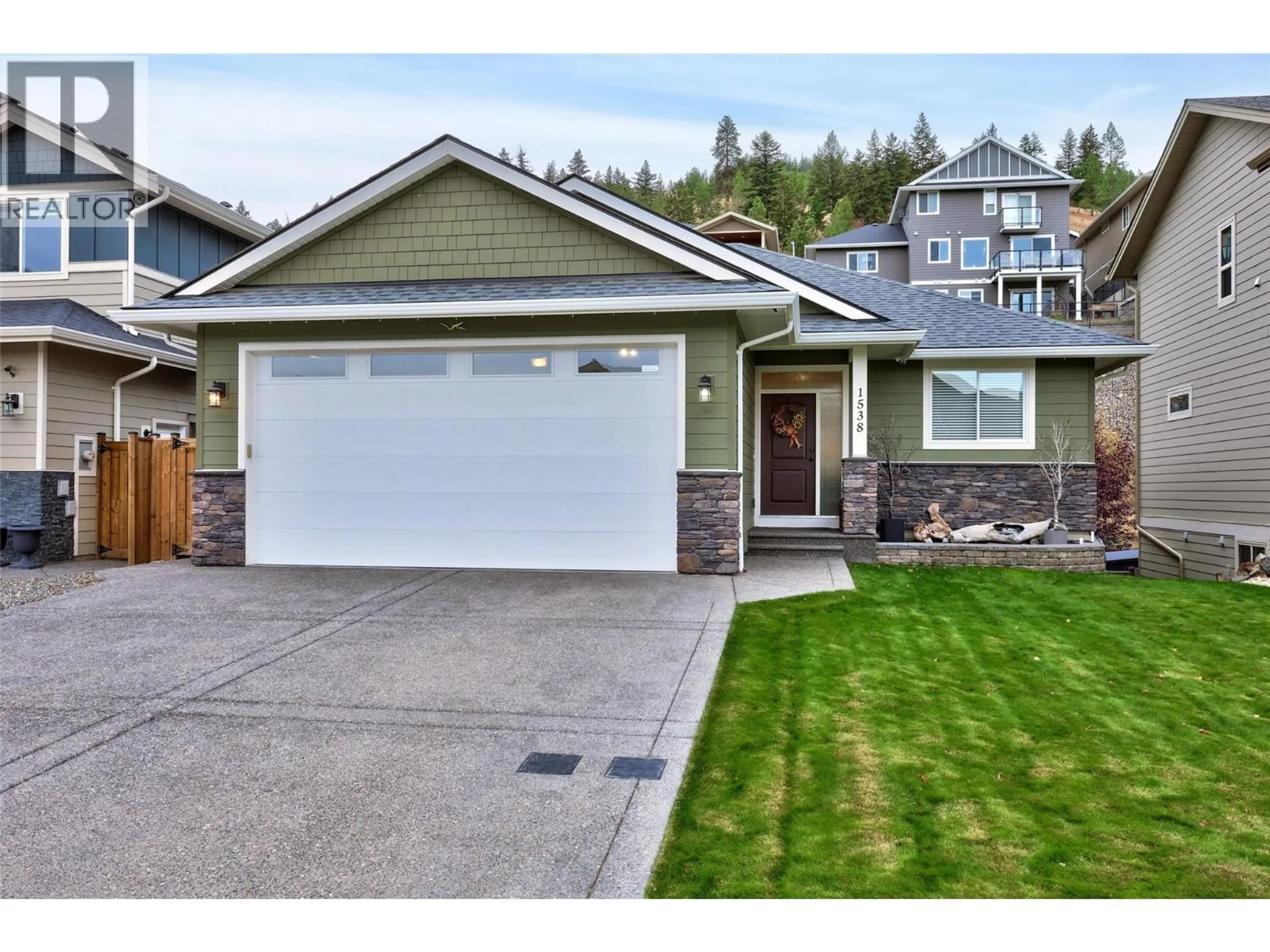 Home with vinyl exterior material, street for 1538 EMERALD DRIVE, Kamloops British Columbia V2E0C1