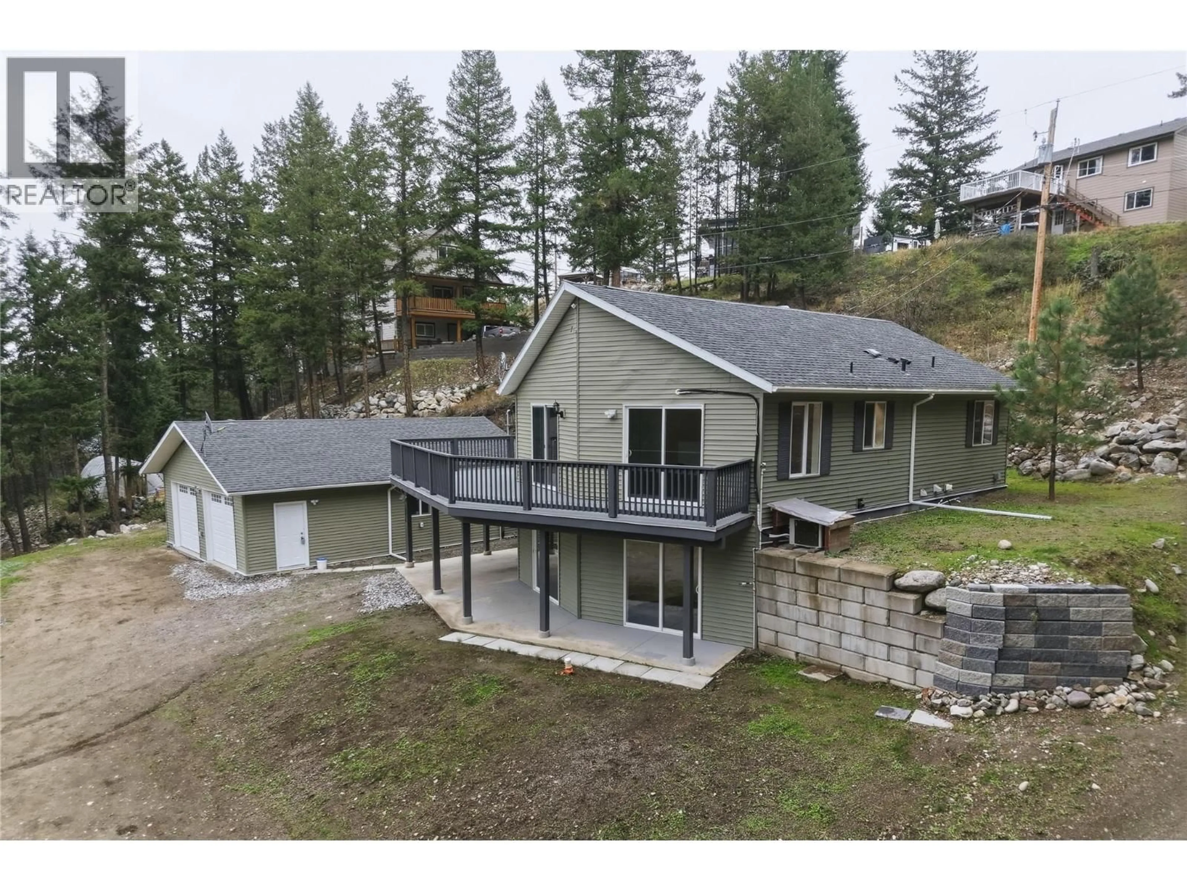 A pic from outside/outdoor area/front of a property/back of a property/a pic from drone, unknown for 10824 WESTSHORE ROAD, Vernon British Columbia V1H2C3