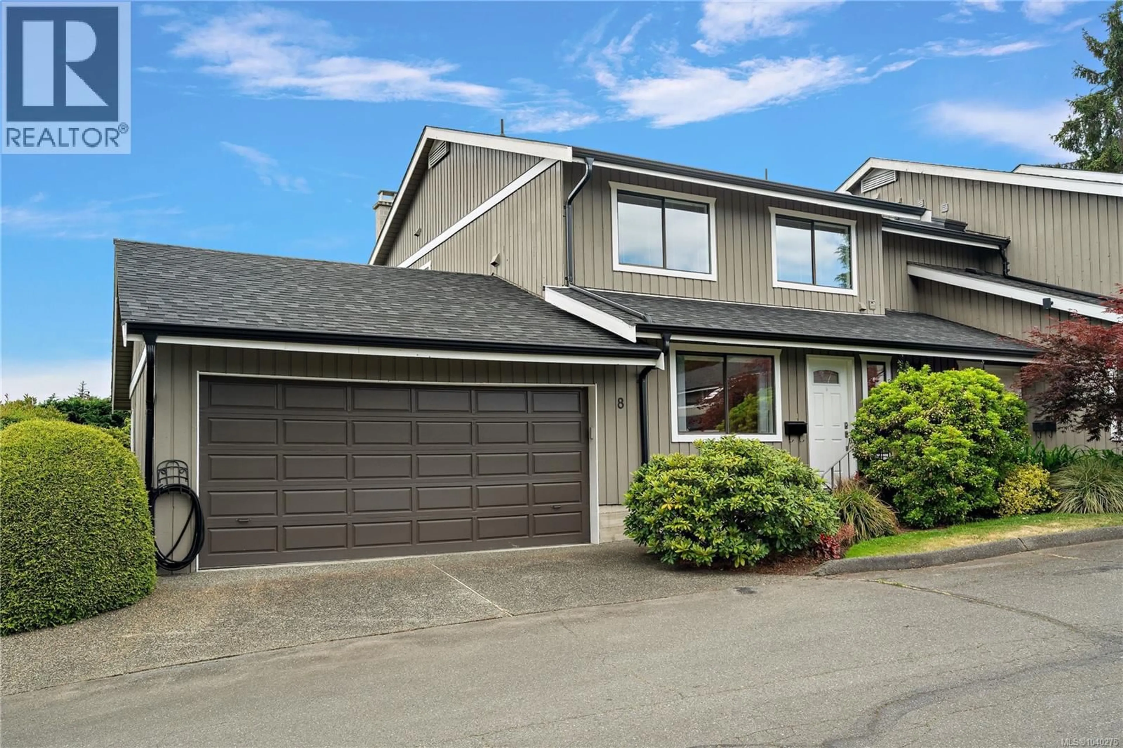 Home with vinyl exterior material, street for 8 - 1950 CULTRA AVENUE, Central Saanich British Columbia V8M1Y9