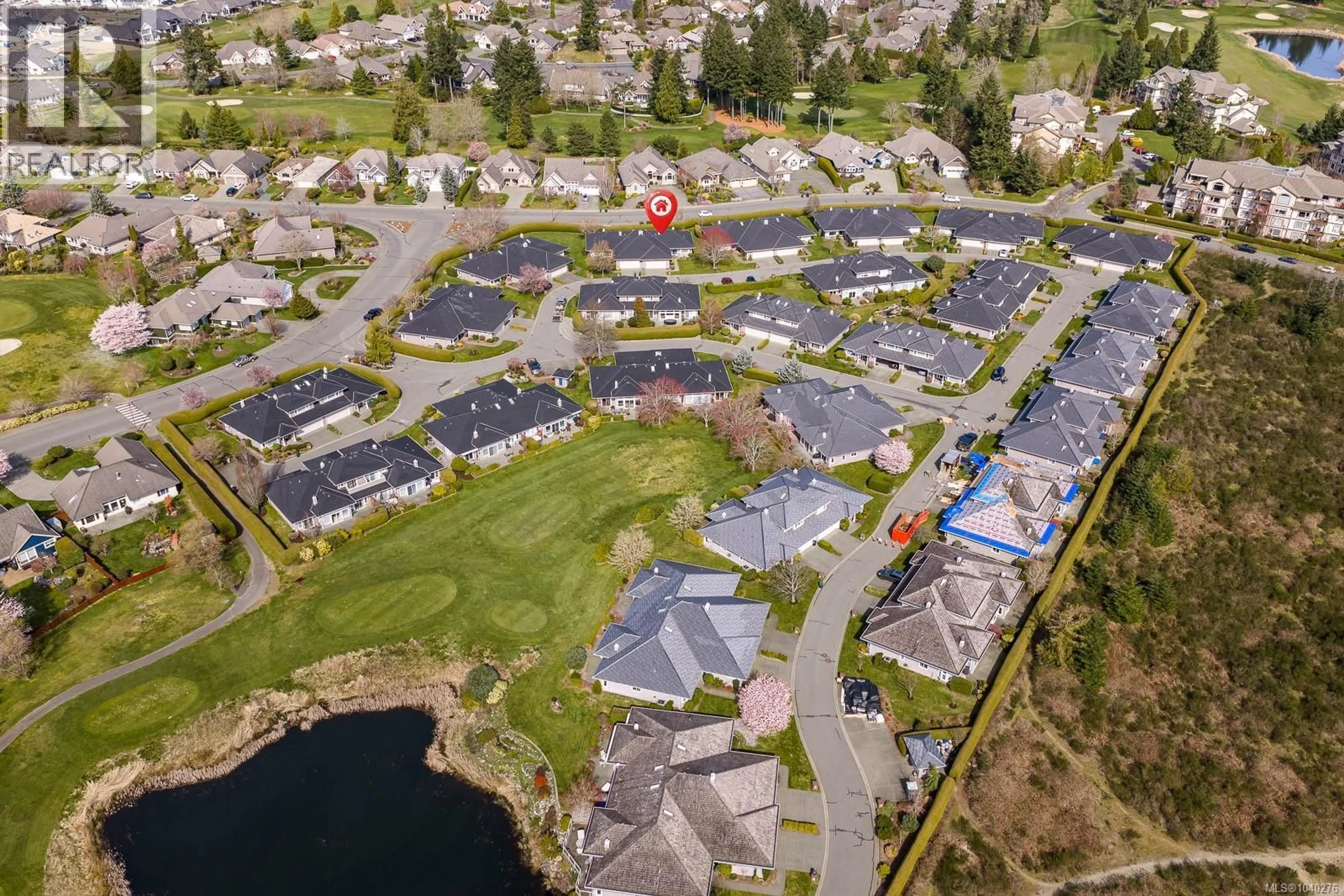 A pic from outside/outdoor area/front of a property/back of a property/a pic from drone, water/lake/river/ocean view for 237 - 3399 CROWN ISLE DRIVE, Courtenay British Columbia V9N9X7