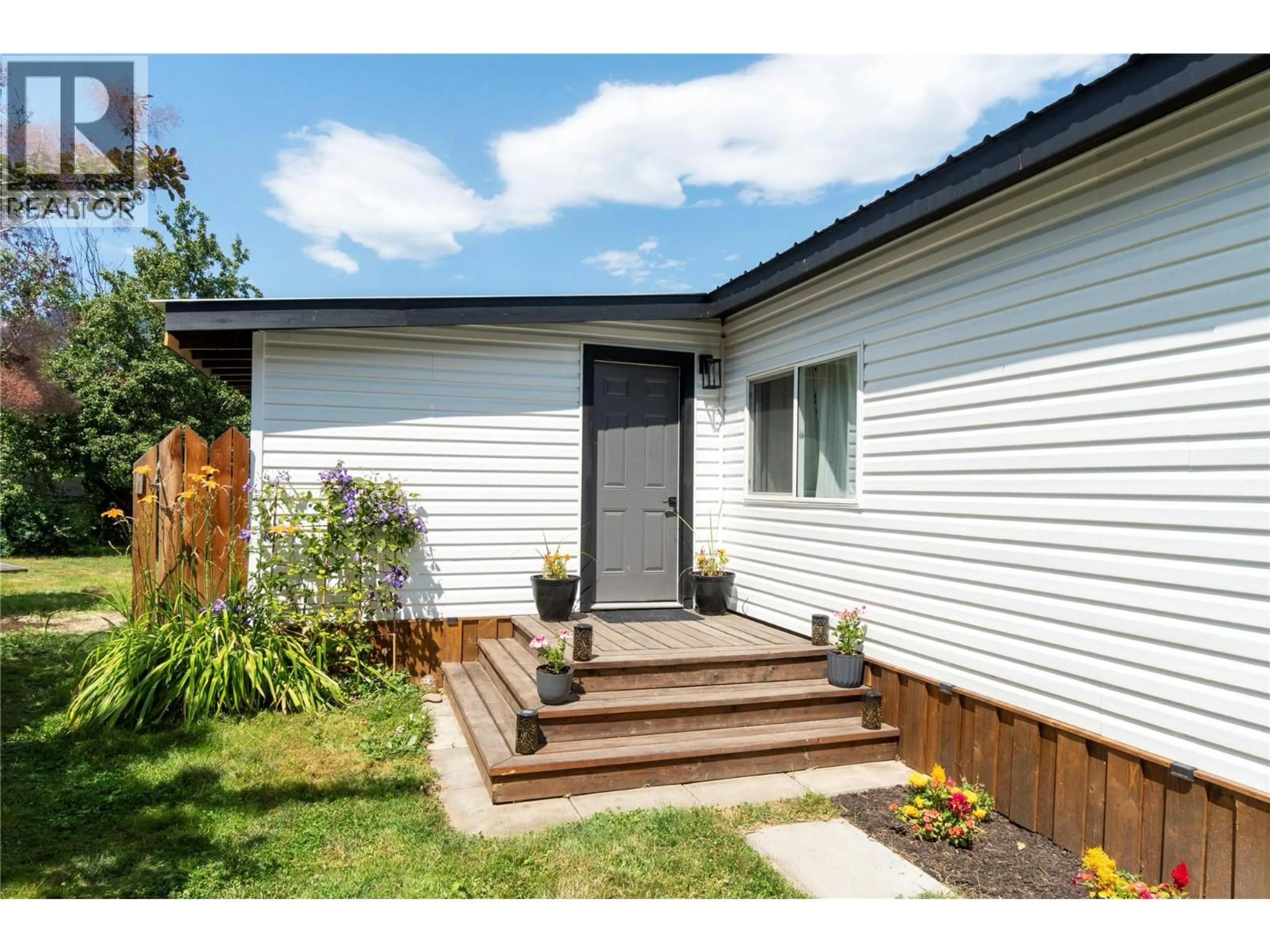 Home with vinyl exterior material, street for 5131 69 AVENUE NORTHEAST, Salmon Arm British Columbia V0E1K0