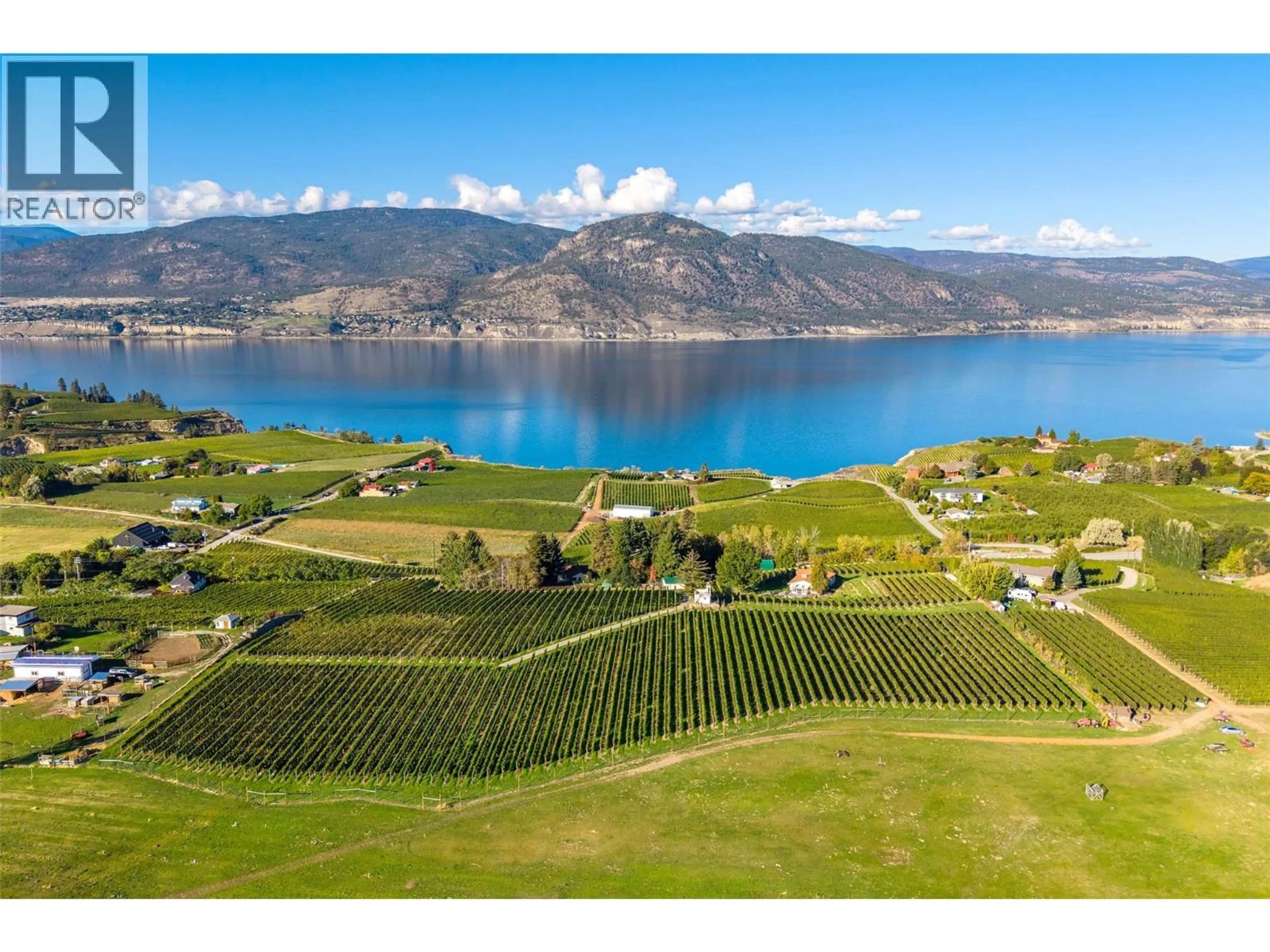 A pic from outside/outdoor area/front of a property/back of a property/a pic from drone, water/lake/river/ocean view for 1056 NARAMATA ROAD, Penticton British Columbia V2A8V1