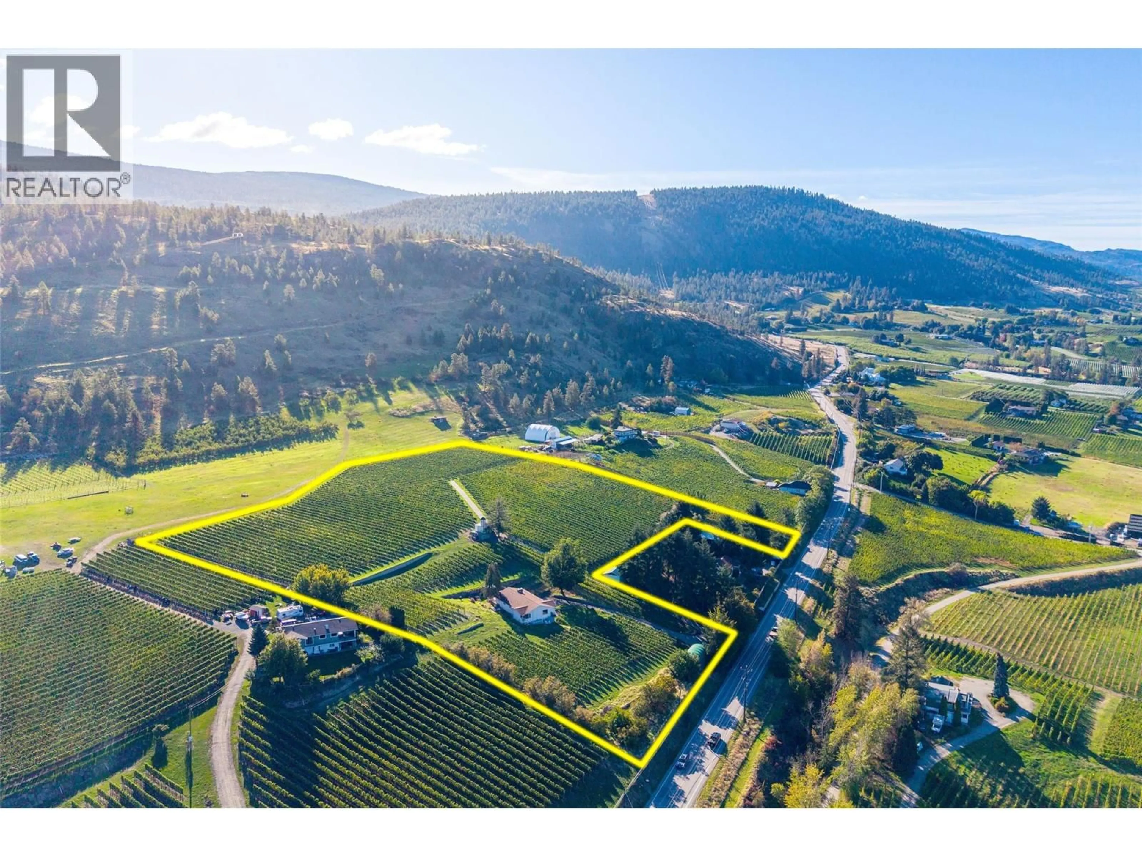 A pic from outside/outdoor area/front of a property/back of a property/a pic from drone, water/lake/river/ocean view for 1056 NARAMATA ROAD, Penticton British Columbia V2A8V1
