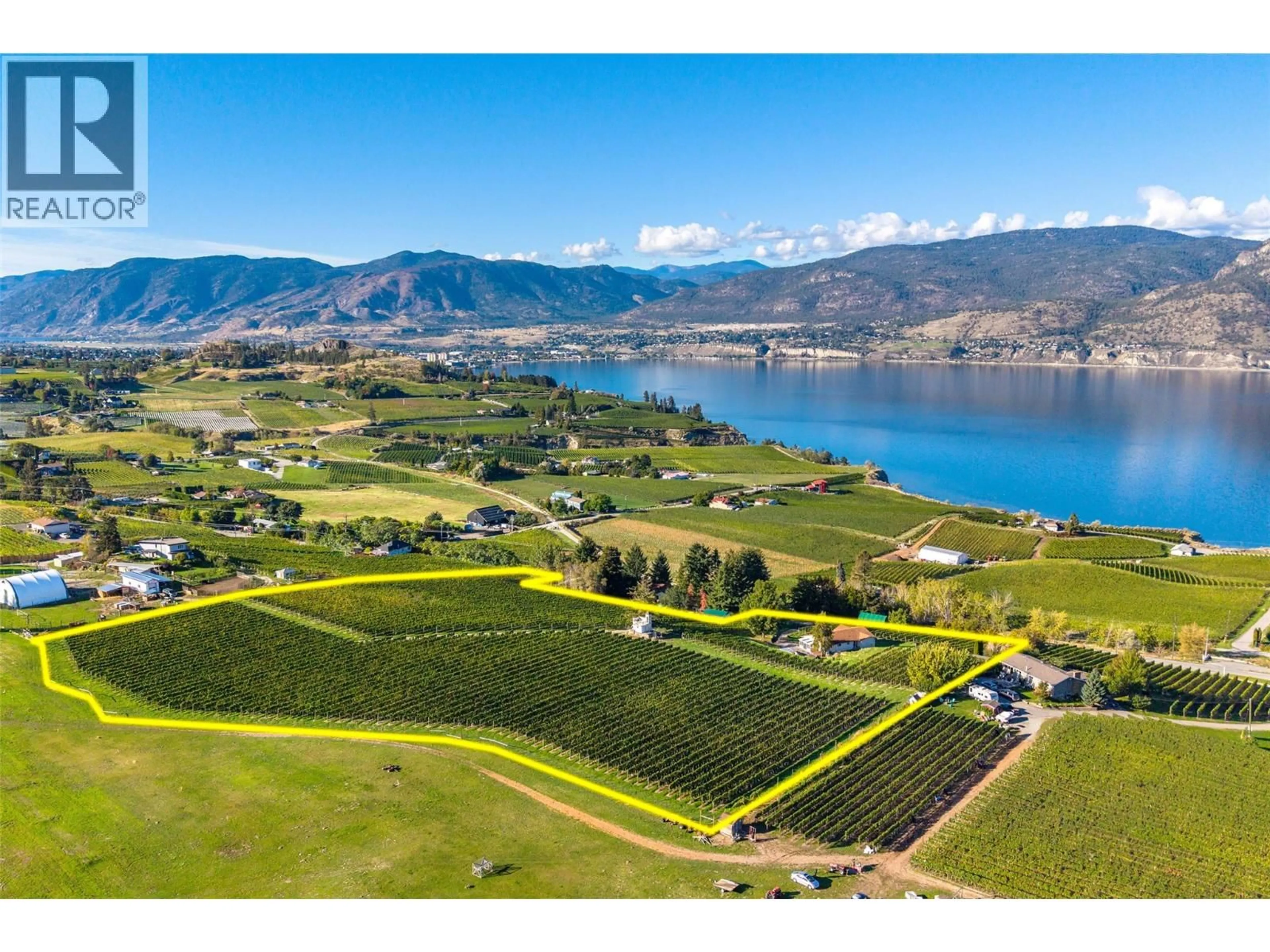 A pic from outside/outdoor area/front of a property/back of a property/a pic from drone, water/lake/river/ocean view for 1056 NARAMATA ROAD, Penticton British Columbia V2A8V1
