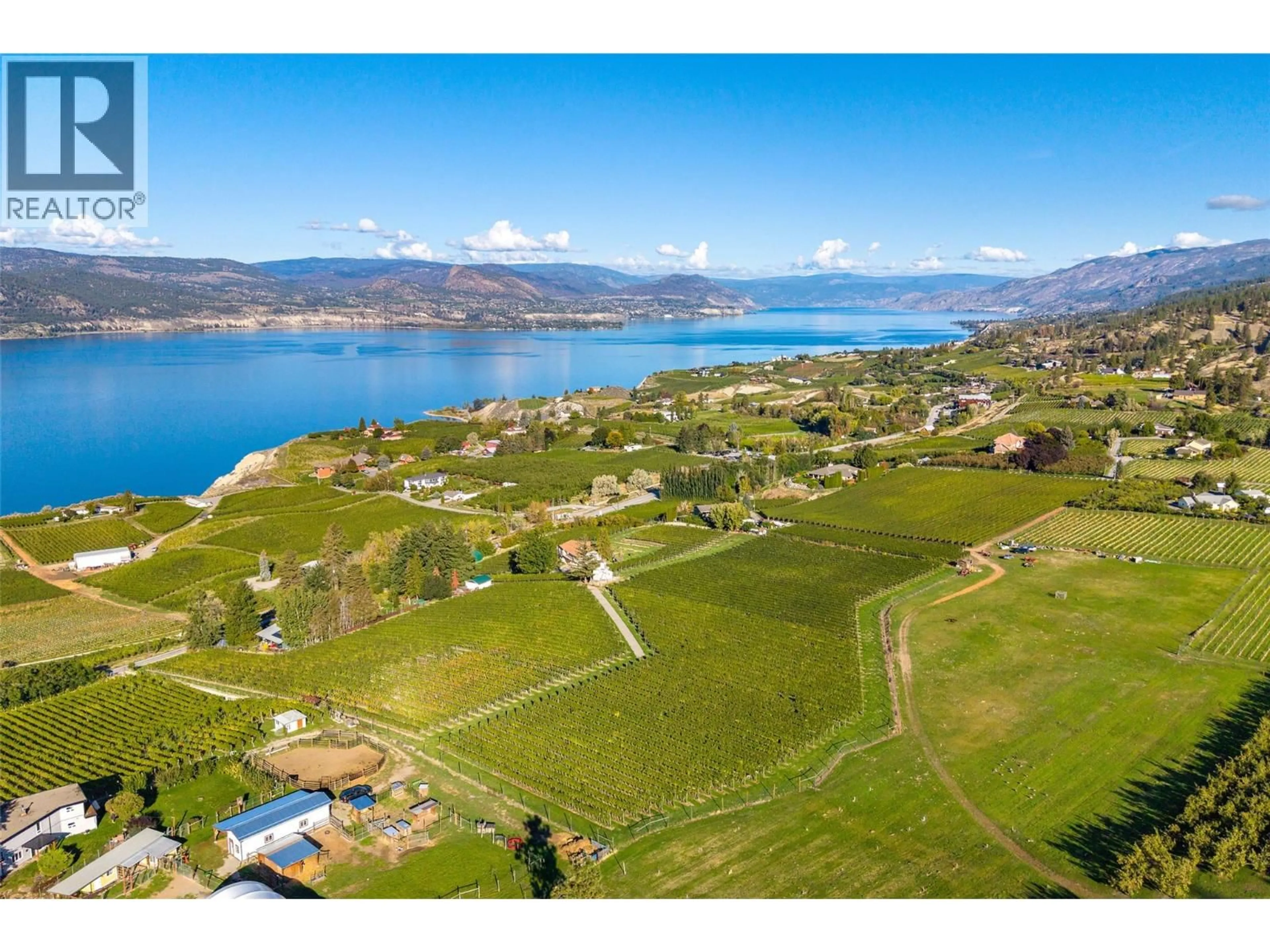 A pic from outside/outdoor area/front of a property/back of a property/a pic from drone, water/lake/river/ocean view for 1056 NARAMATA ROAD, Penticton British Columbia V2A8V1