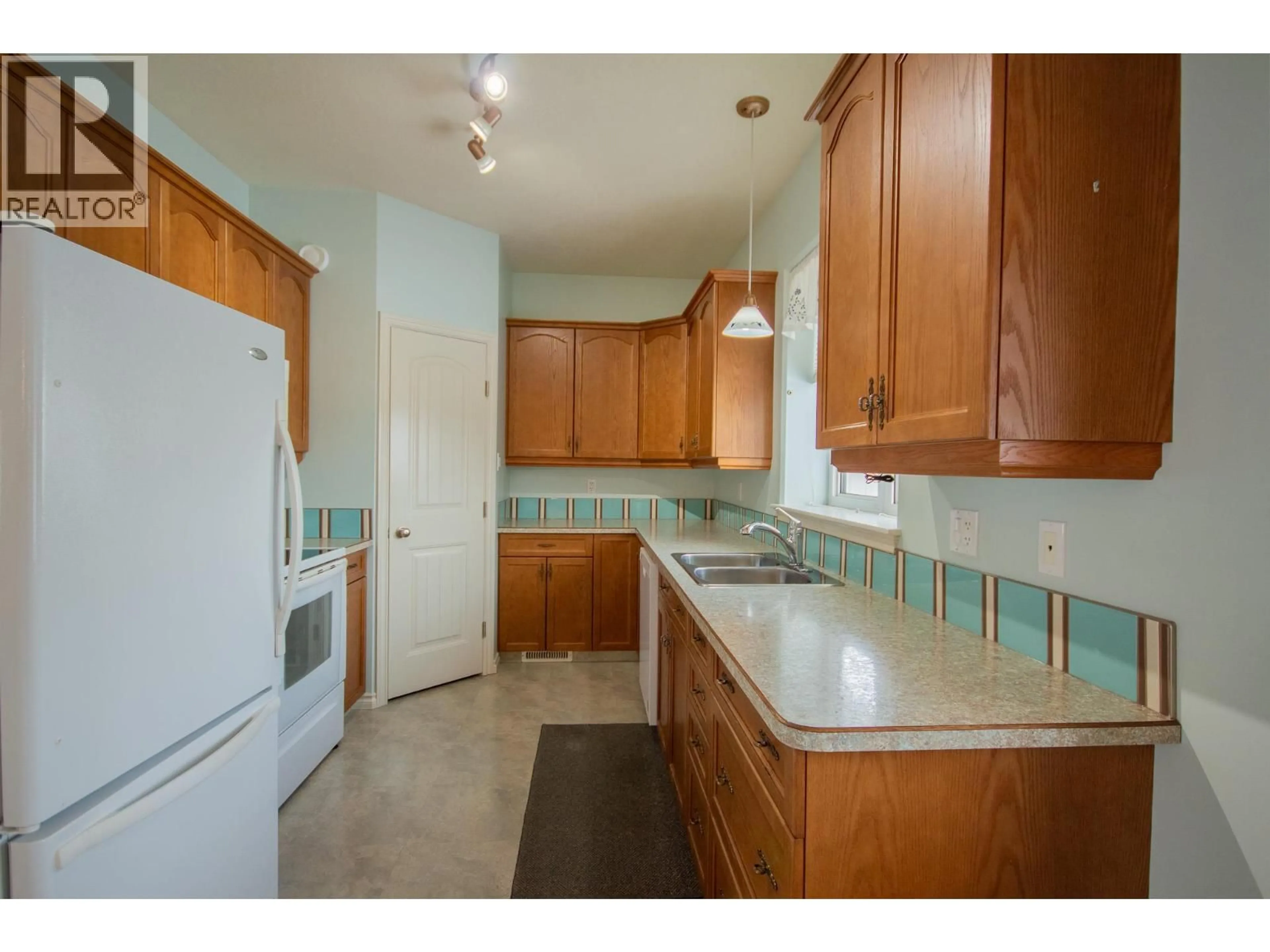 Standard kitchen, ceramic/tile floor for 1 - 11001 17 STREET, Dawson Creek British Columbia V1G0B7