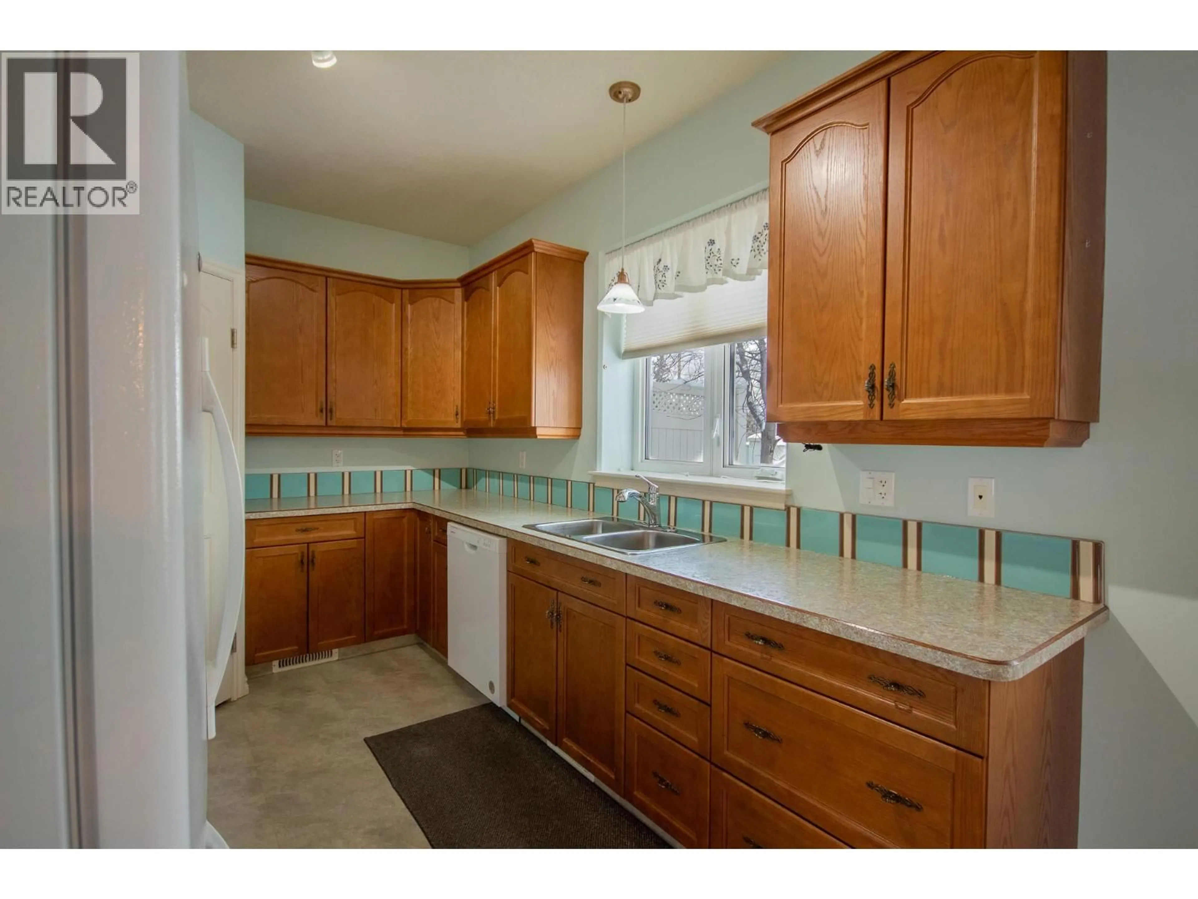 Standard kitchen, ceramic/tile floor for 1 - 11001 17 STREET, Dawson Creek British Columbia V1G0B7