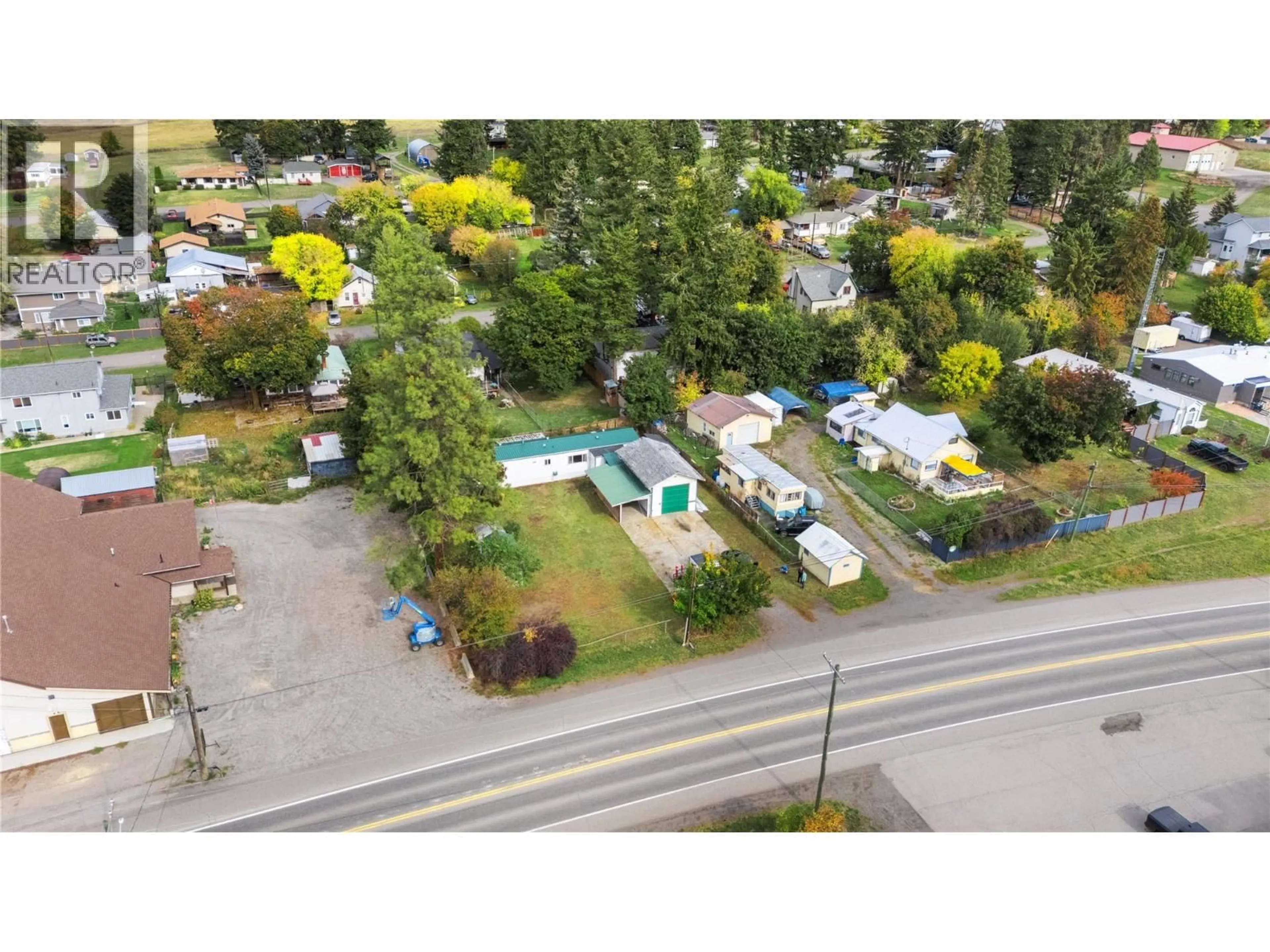 A pic from outside/outdoor area/front of a property/back of a property/a pic from drone, street for 5694 97 HIGHWAY, Falkland British Columbia V0E1W0
