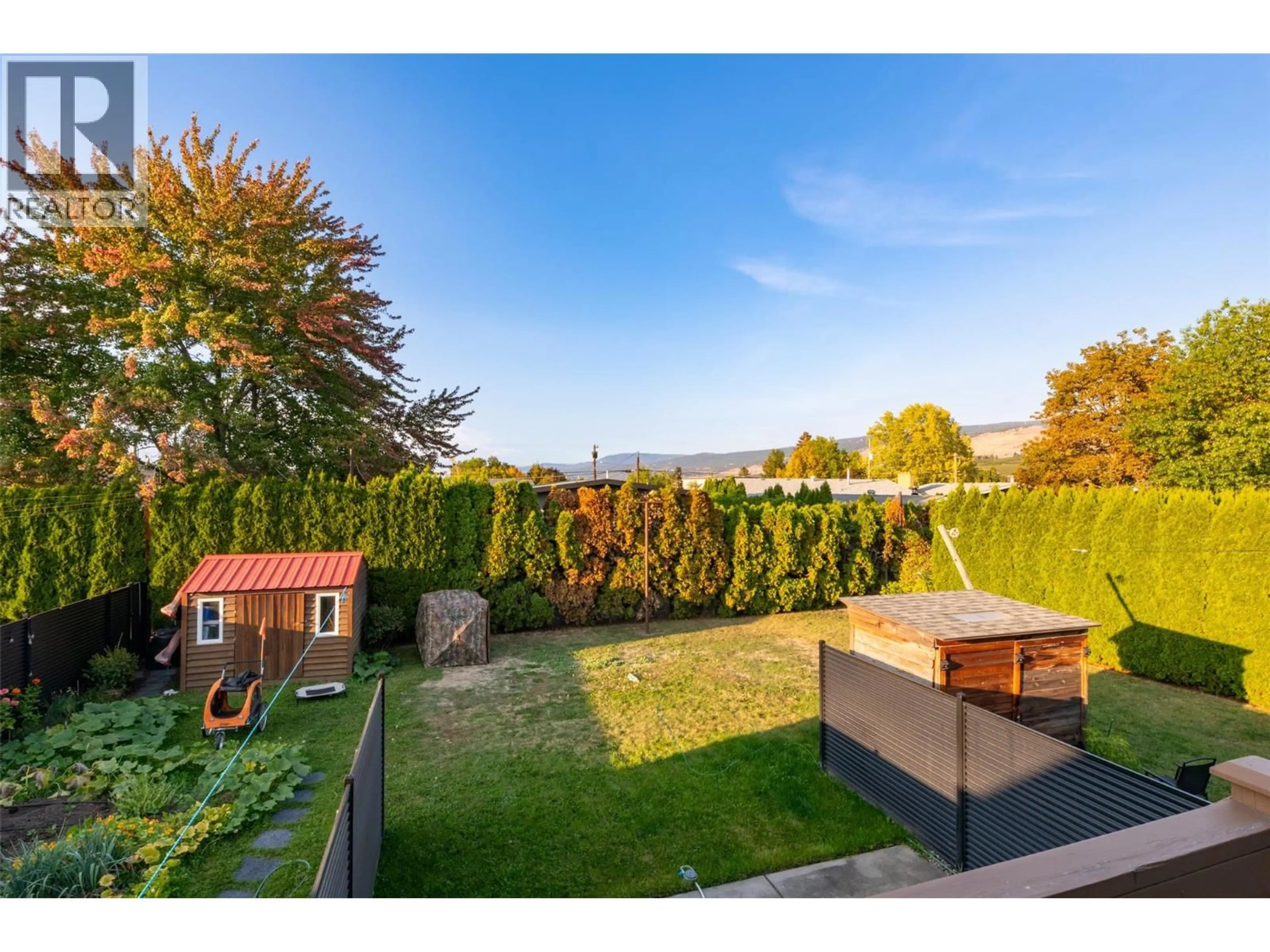 A pic from outside/outdoor area/front of a property/back of a property/a pic from drone, unknown for 246 BRIARWOOD ROAD, Kelowna British Columbia V1X2G3