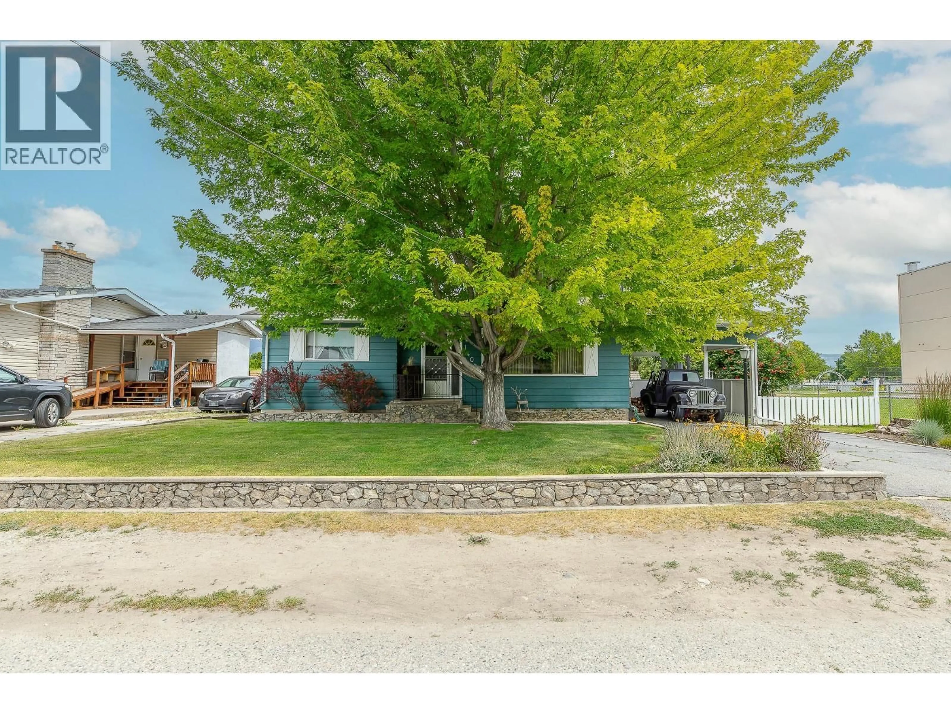 A pic from outside/outdoor area/front of a property/back of a property/a pic from drone, street for 14001 AMM AVENUE, Summerland British Columbia V0H1Z0