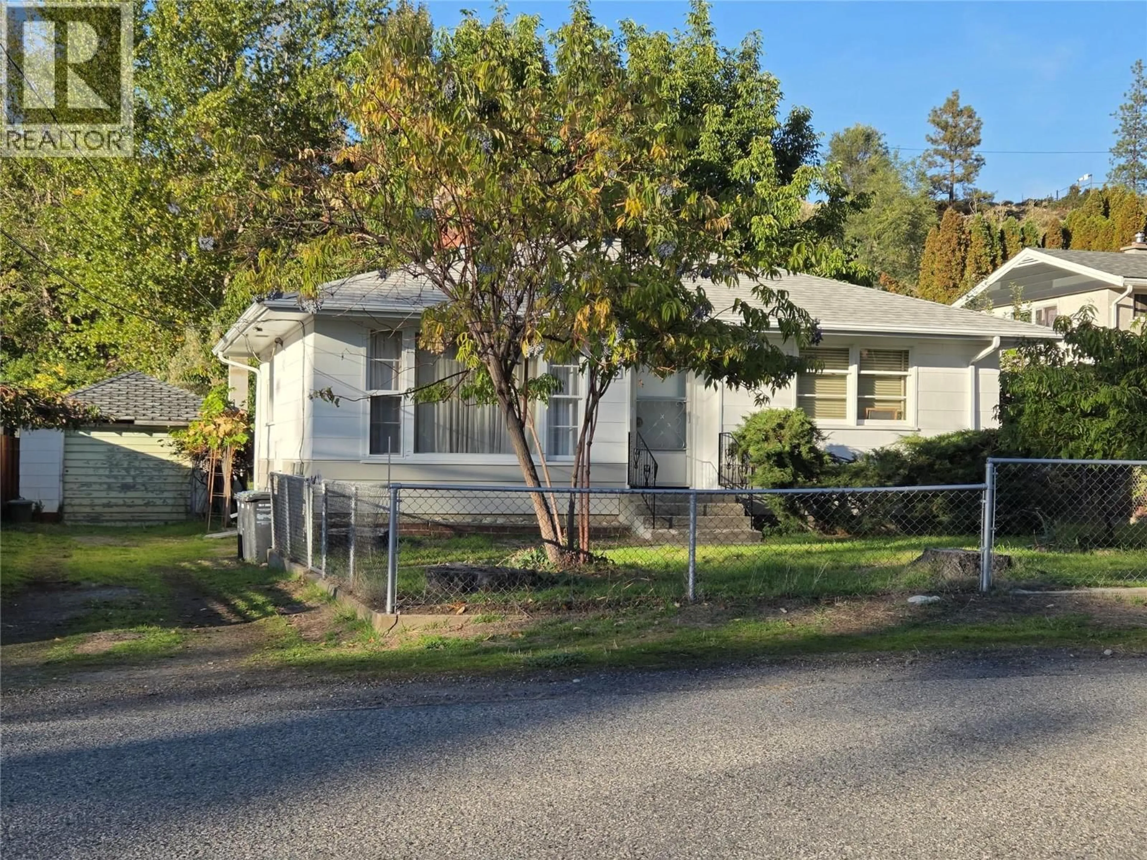 Home with vinyl exterior material, street for 1285 FORESTBROOK DRIVE, Penticton British Columbia V2A2G4