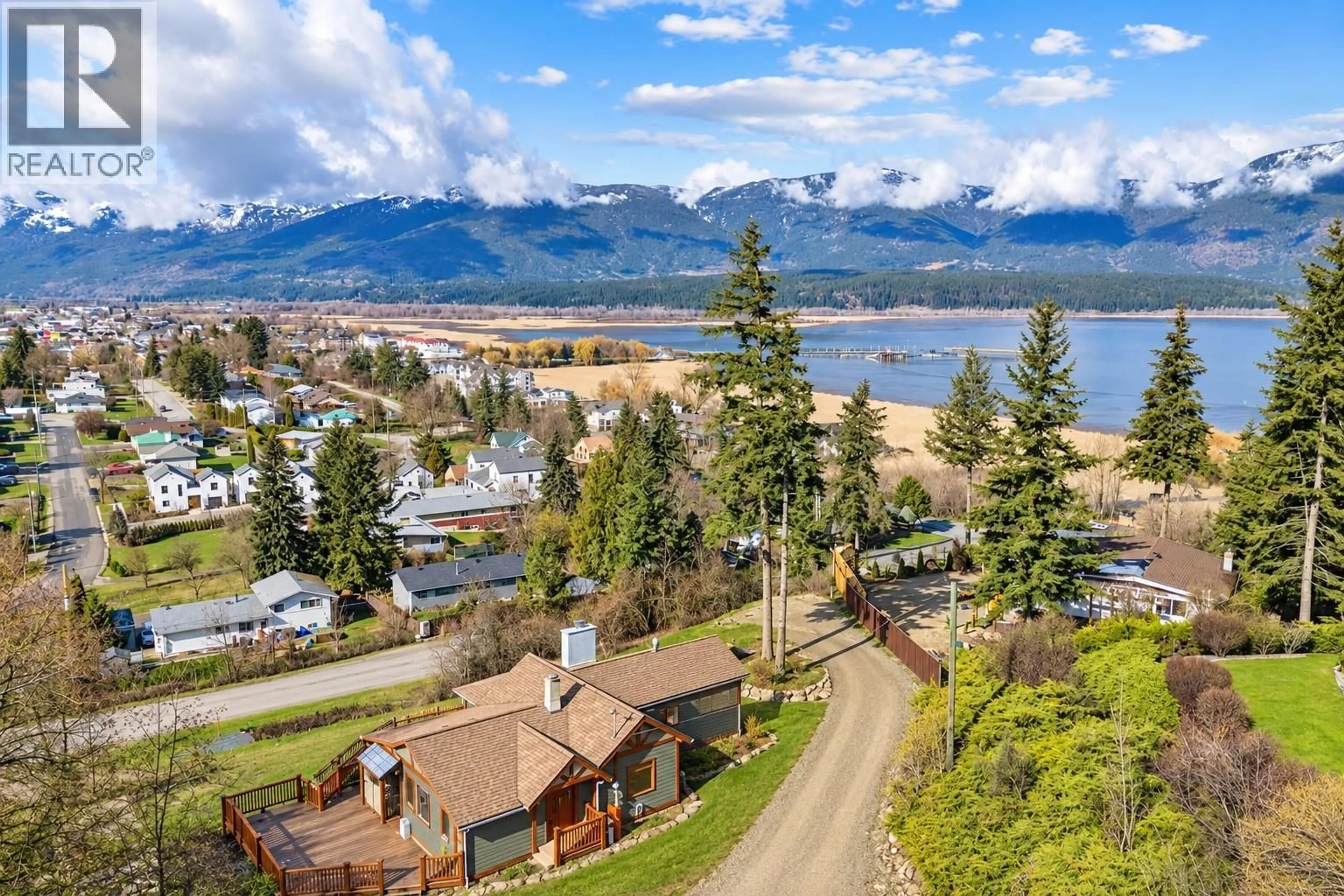 A pic from outside/outdoor area/front of a property/back of a property/a pic from drone, water/lake/river/ocean view for 1321 10TH AVENUE, Salmon Arm British Columbia V1E2V6