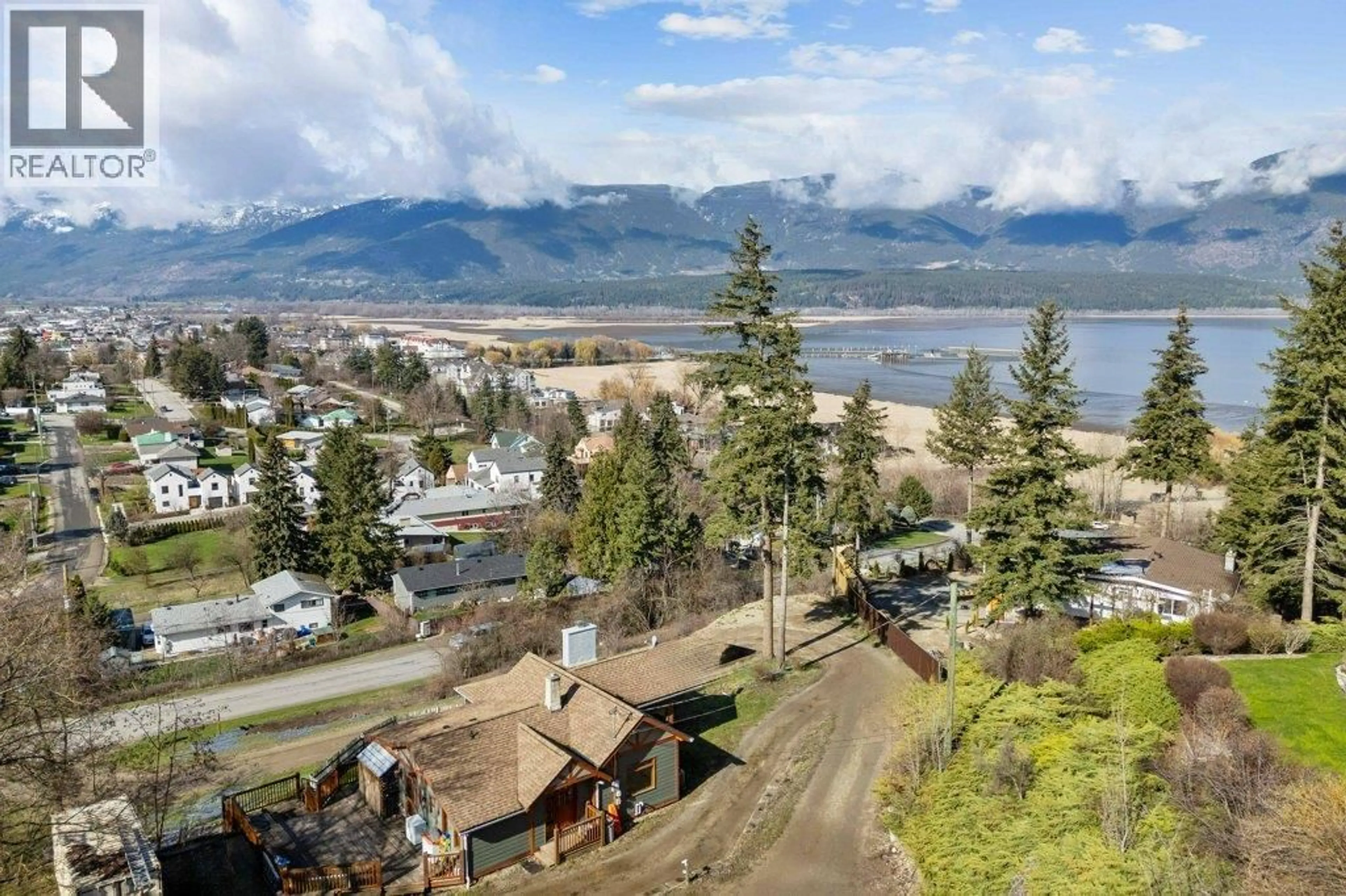 A pic from outside/outdoor area/front of a property/back of a property/a pic from drone, mountain view for 1321 10TH AVENUE, Salmon Arm British Columbia V1E2V6