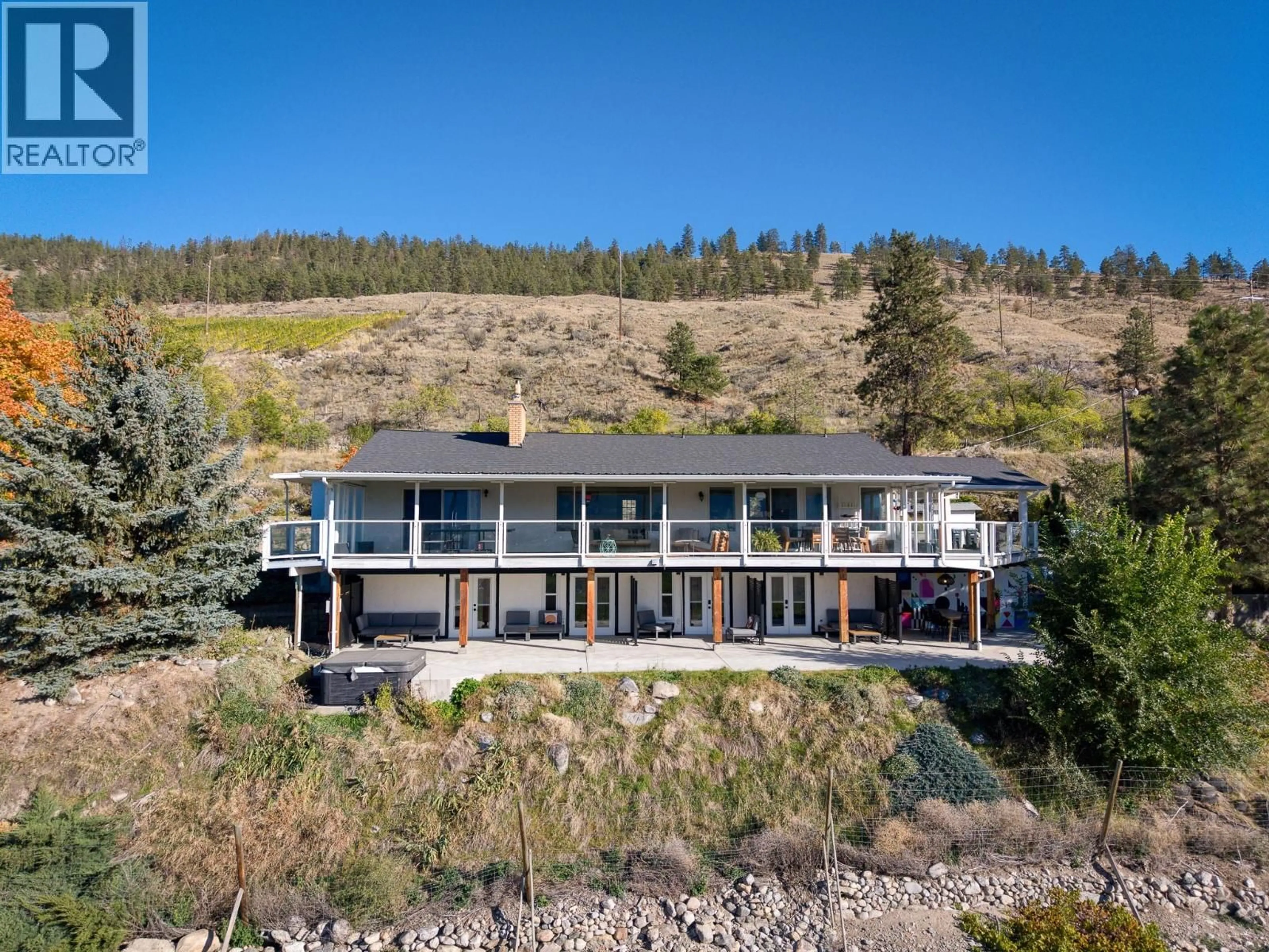 A pic from outside/outdoor area/front of a property/back of a property/a pic from drone, water/lake/river/ocean view for 398 UPPER BENCH ROAD SOUTH, Penticton British Columbia V2A8S9