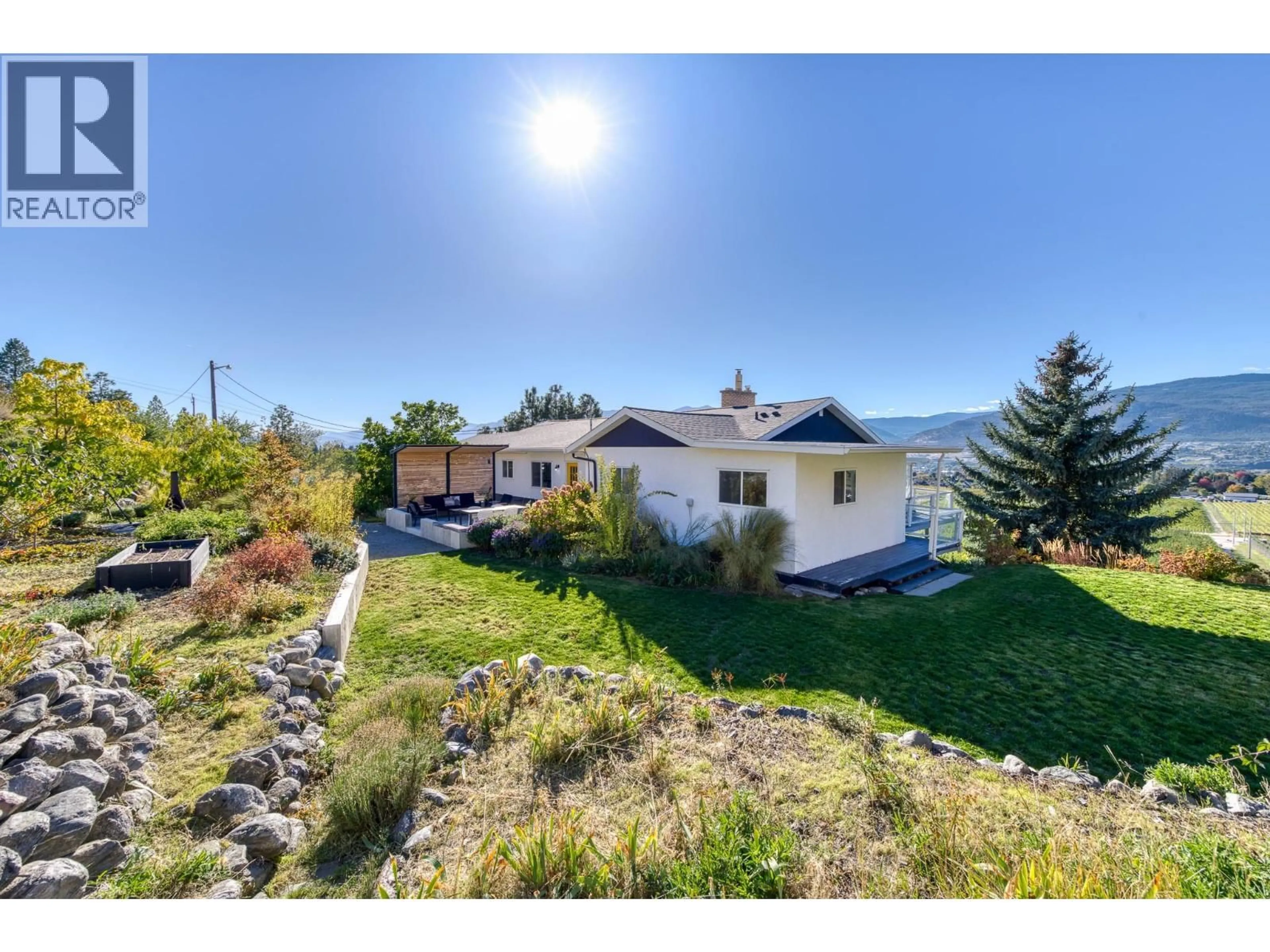 A pic from outside/outdoor area/front of a property/back of a property/a pic from drone, mountain view for 398 UPPER BENCH ROAD SOUTH, Penticton British Columbia V2A8S9